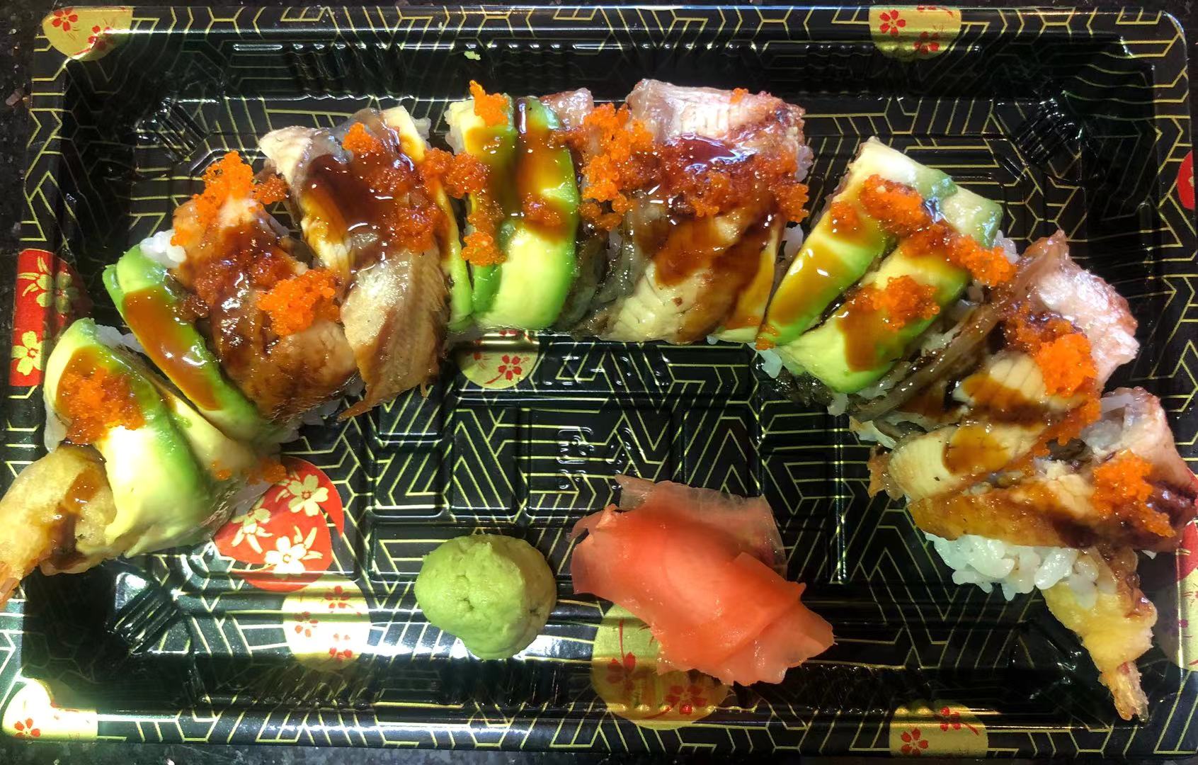 Order 8 Pieces Green Dragon Roll food online from Sakura Hibachi & Poke Bowl store, Upper Marlboro on bringmethat.com