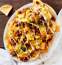 Order Nachos w Chilli & Cheese food online from Flavors Nyc store, New York on bringmethat.com