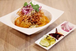 Order Kao Soi food online from Golden Triangle Cuisine store, Los Gatos on bringmethat.com