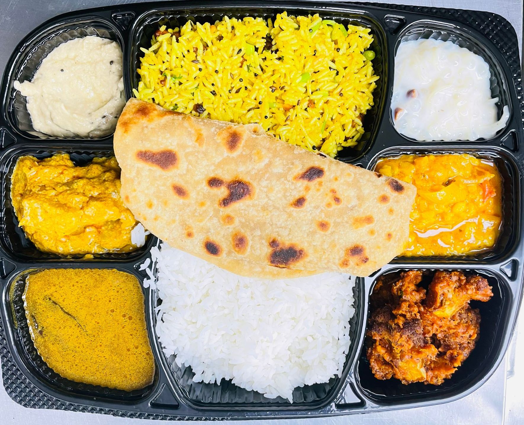 Order Maharaja Veg Thali food online from Ahaa Kitchen store, Irving on bringmethat.com