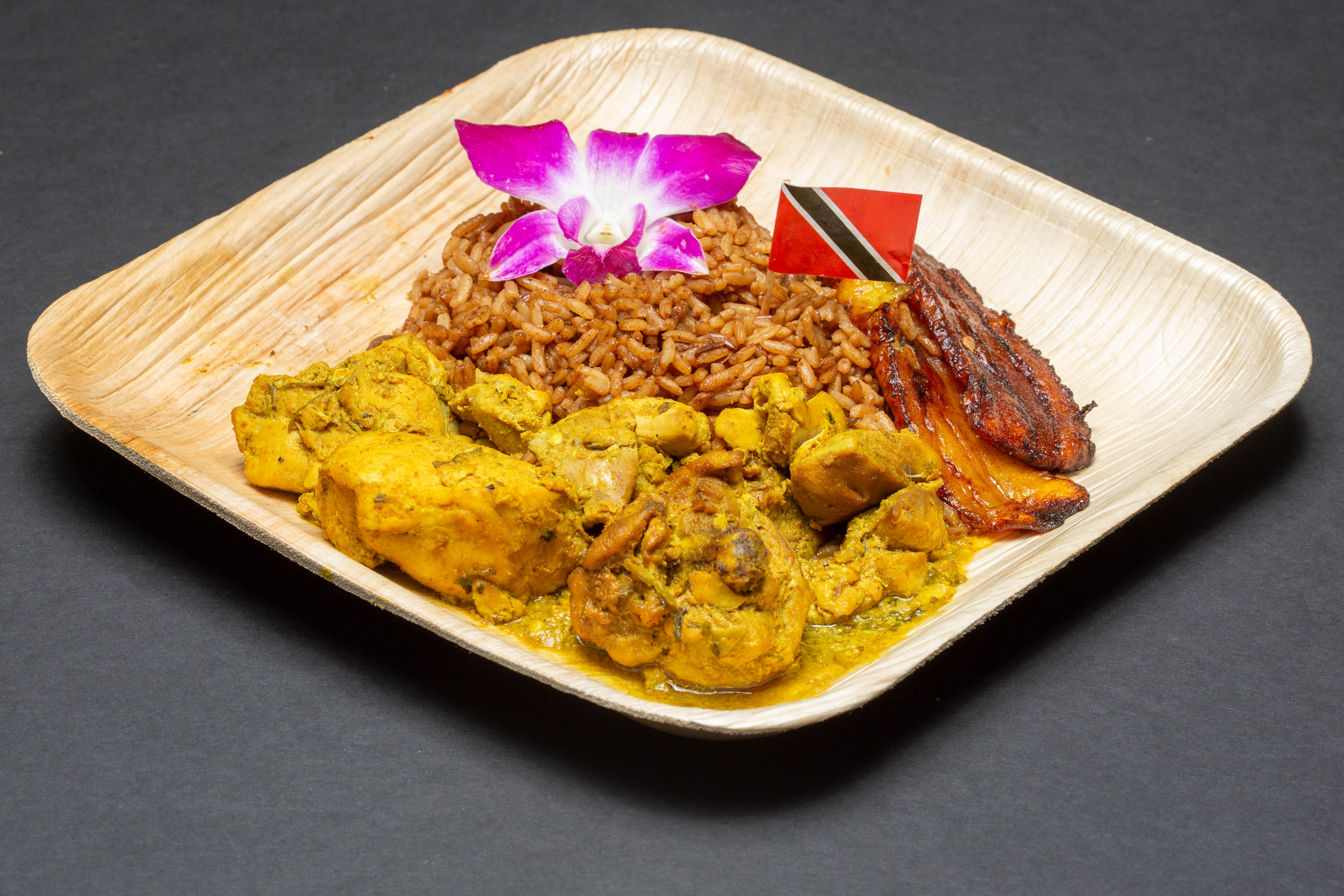 Order Curry Chicken with Pelau food online from Cocobreeze store, Oakland on bringmethat.com