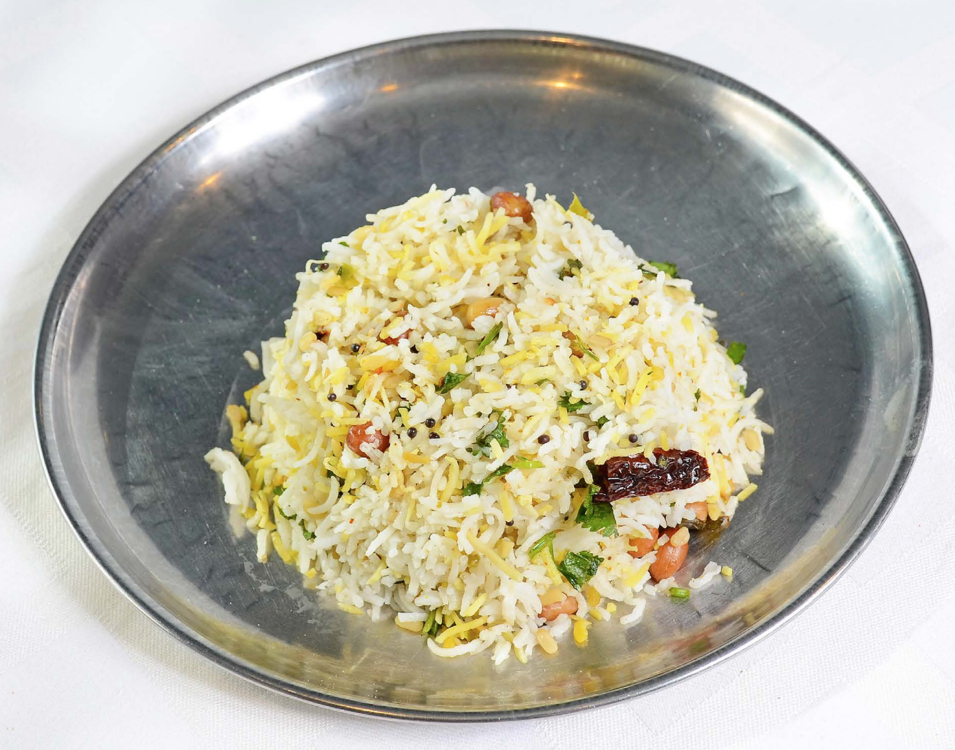 Order Coconut Rice food online from Shri Balaji Bhavan store, Houston on bringmethat.com