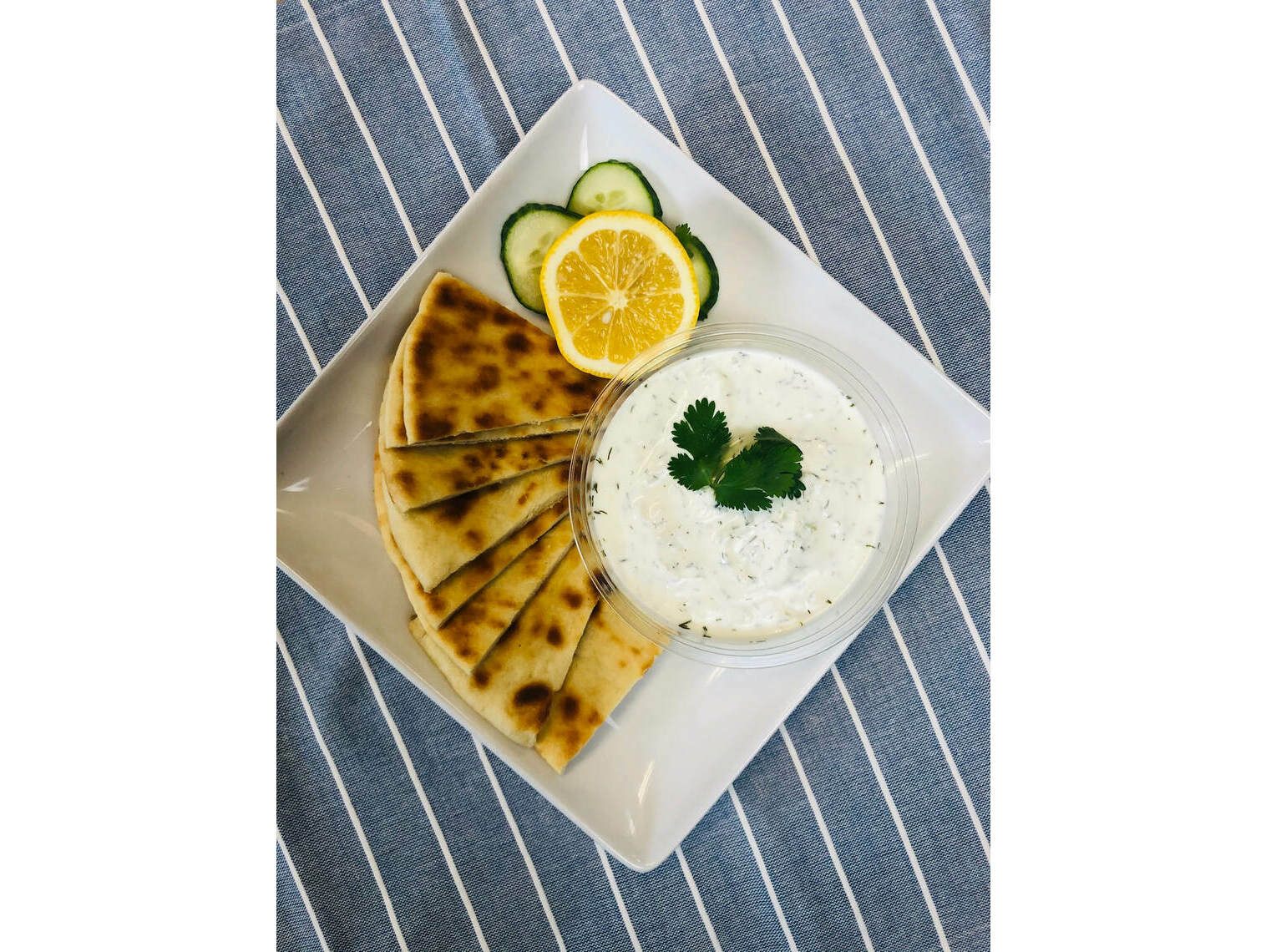 Order Pita and Tzatziki - D food online from The Counter At Old Ballard Catering Co. store, Seattle on bringmethat.com