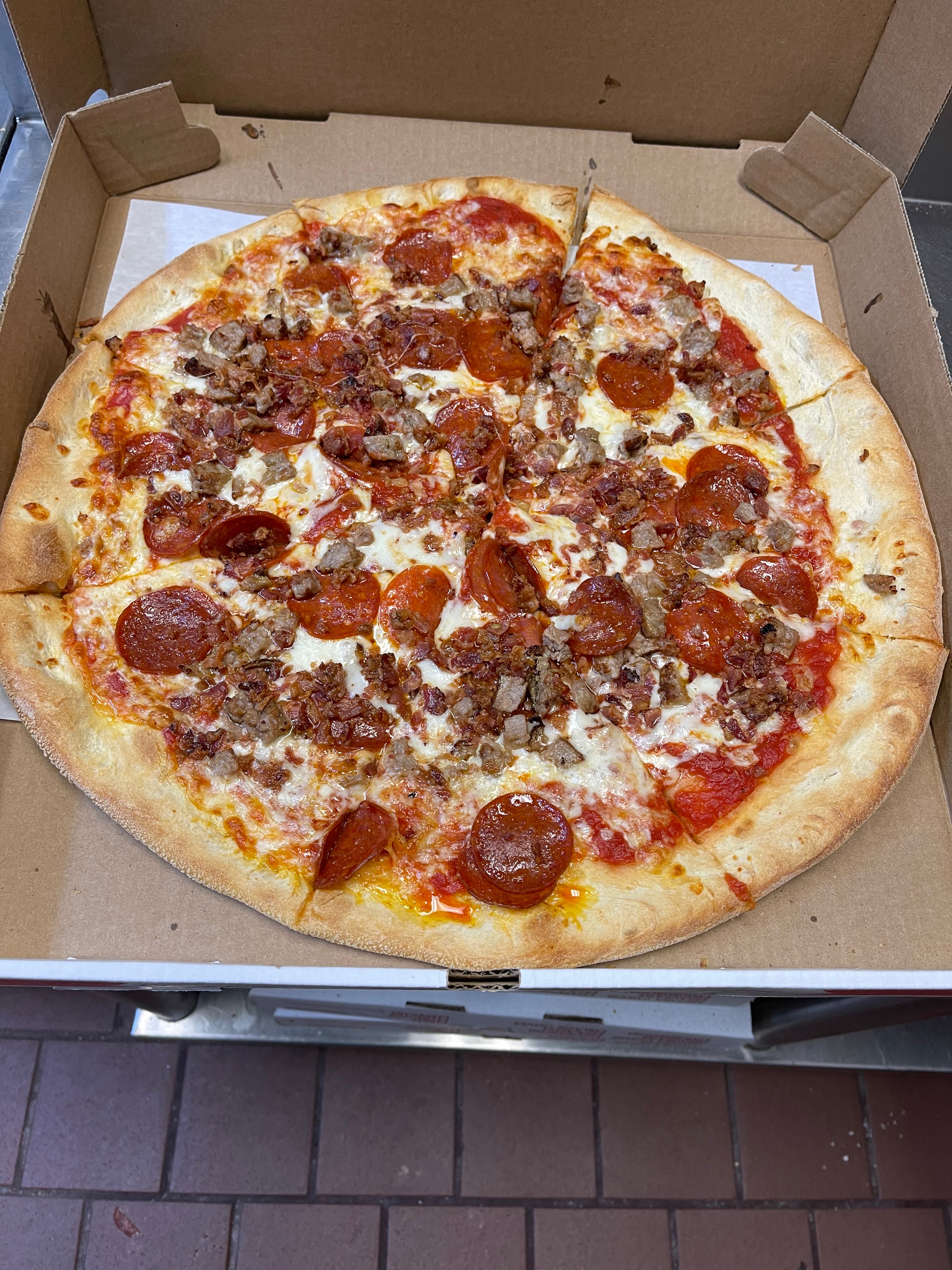 Order Meat Lovers Pizza - Medium 14" food online from Pizza Plaza Of Warminster store, Warminster on bringmethat.com