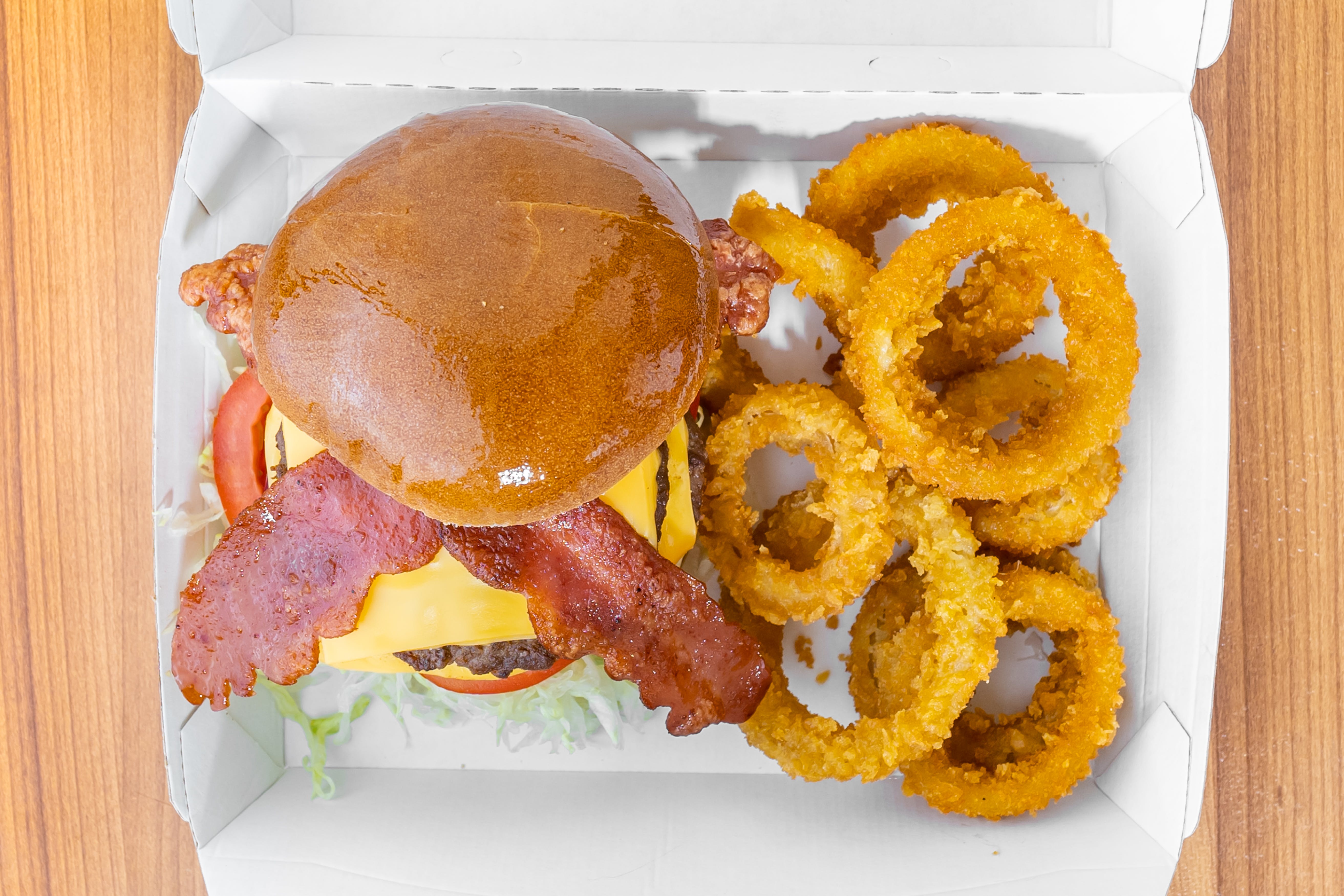 Order Double Cheseburger - Burger food online from Crown Pizza store, College Park on bringmethat.com