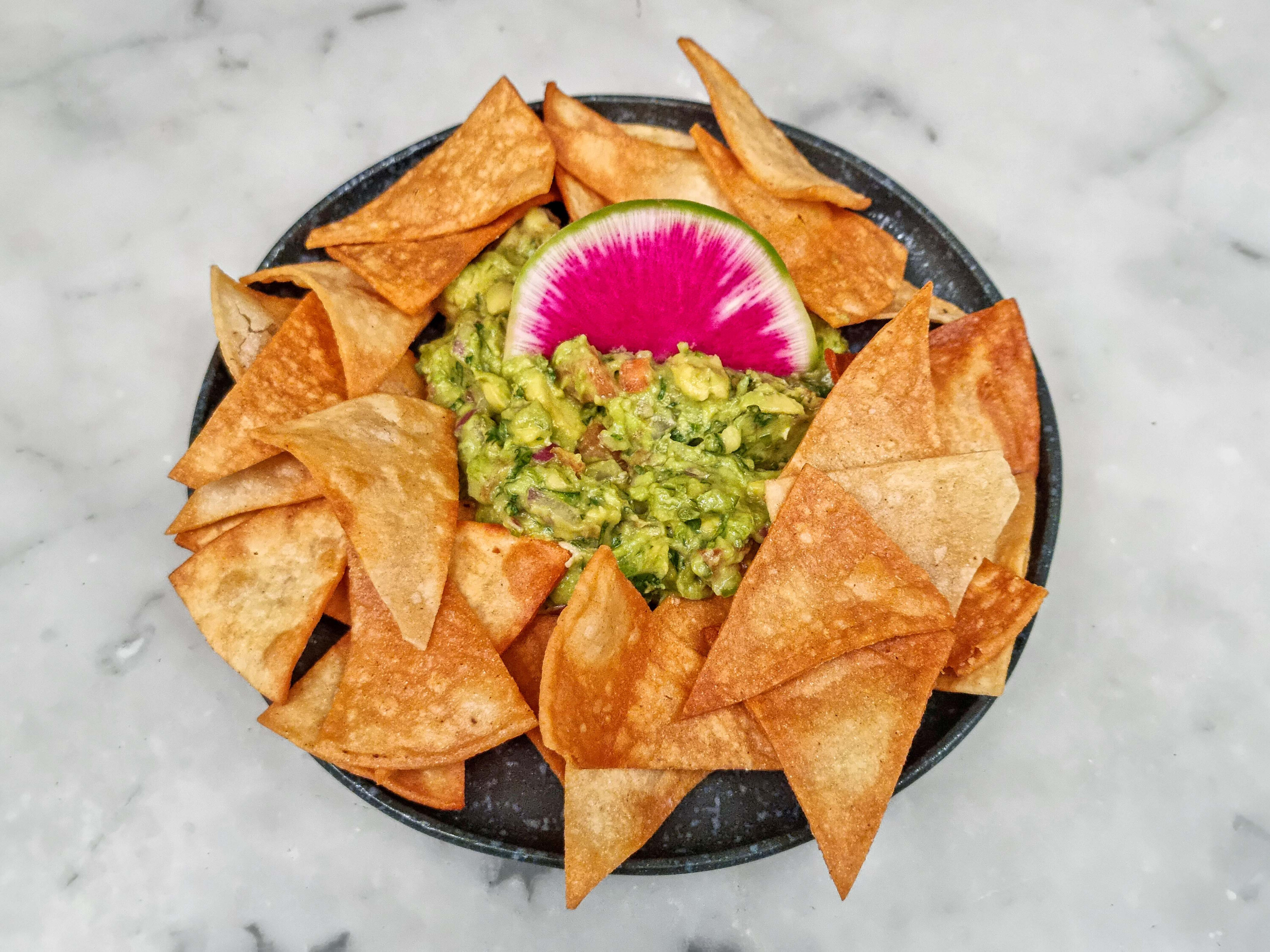 Order Guacamole Tradicional food online from Tacobar Upper West Side store, New York on bringmethat.com
