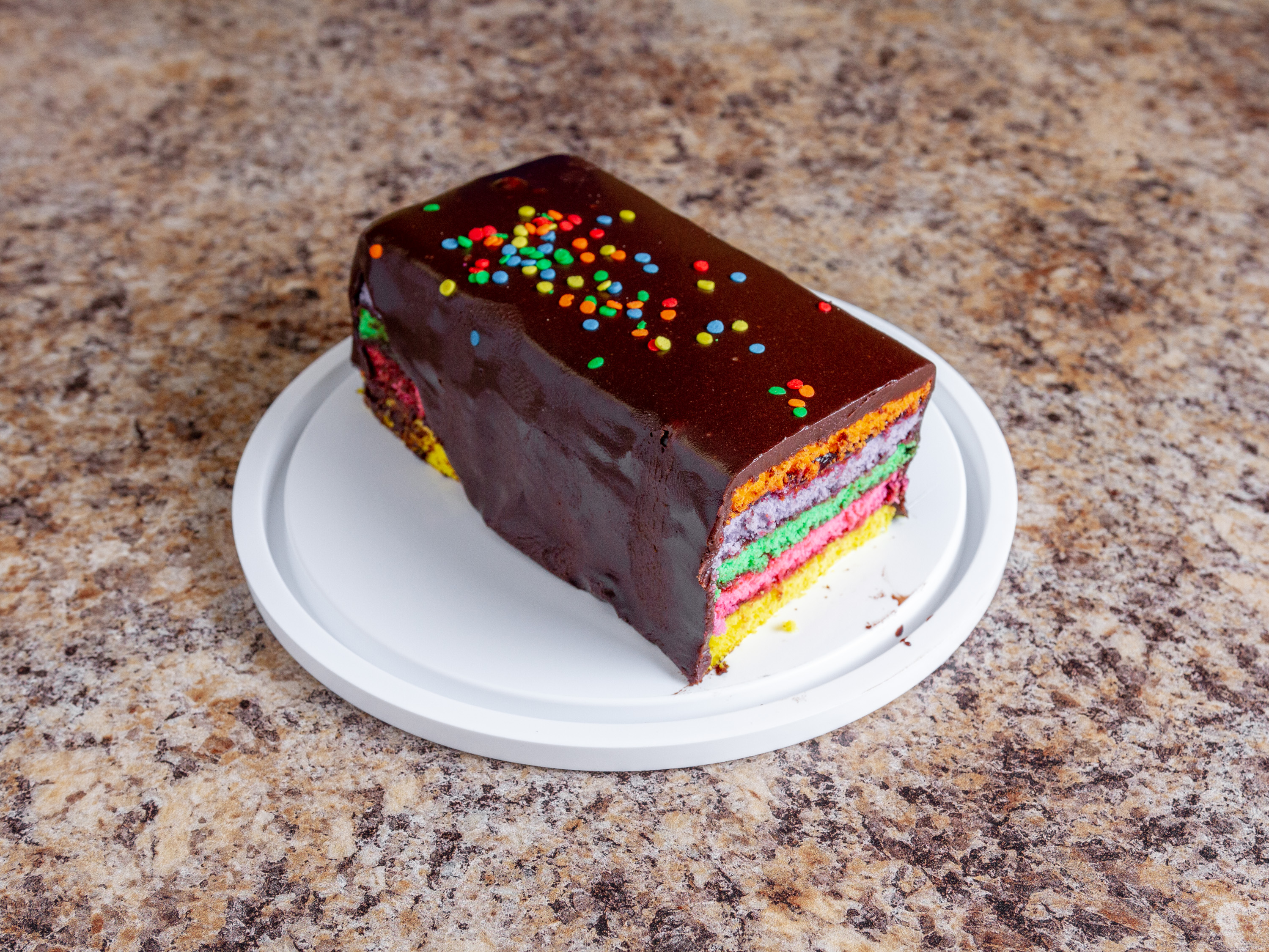 Order Rainbow Cake food online from Pariser Bakery store, Baltimore on bringmethat.com