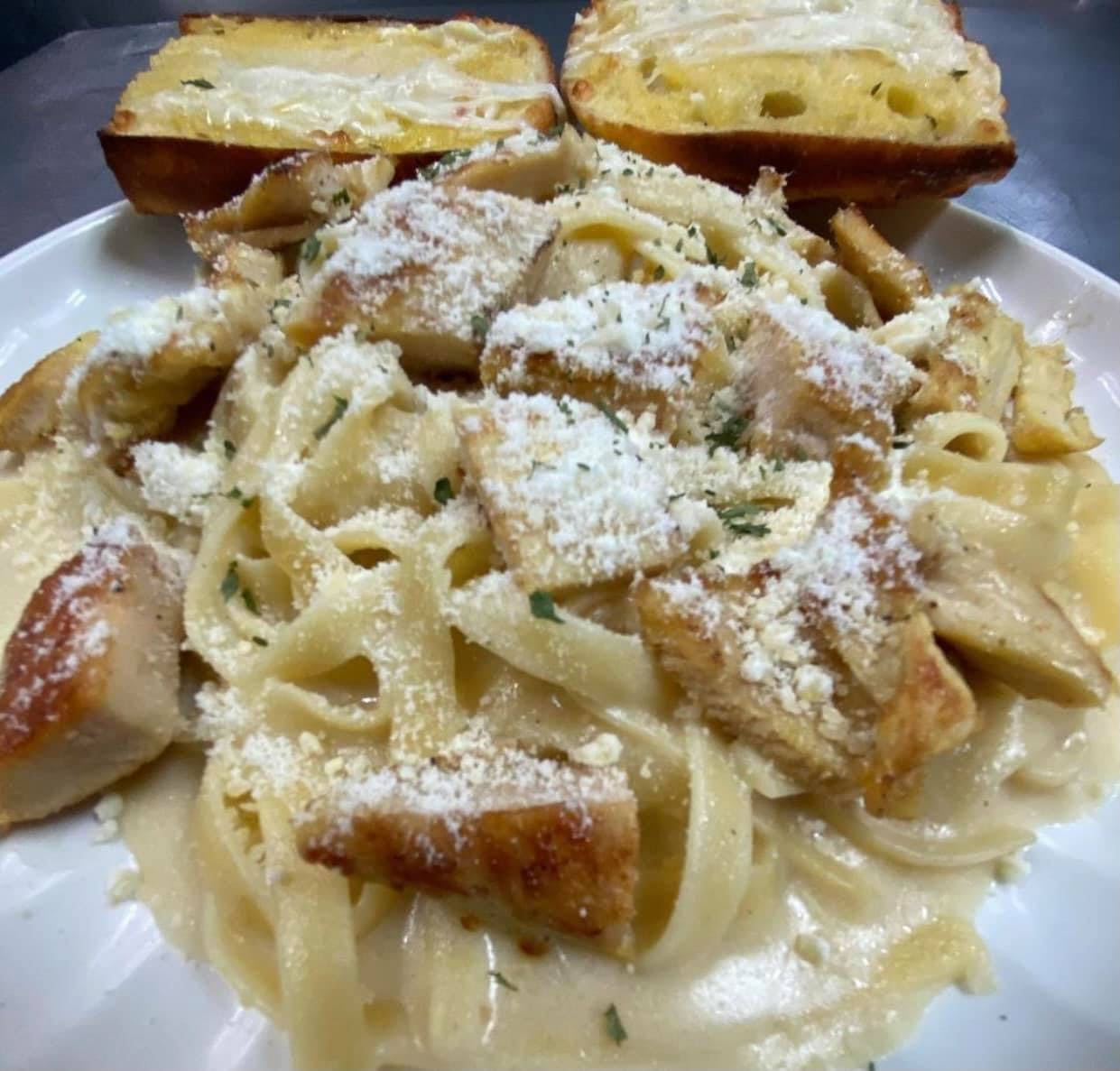 Order Fettuccine Alfredo Chicken Pasta - Pasta food online from Andy Pizzeria store, Los Angeles on bringmethat.com