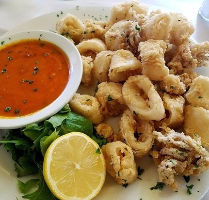 Order 14. Fried  Calamari food online from Chicken Coop store, Valley Stream on bringmethat.com
