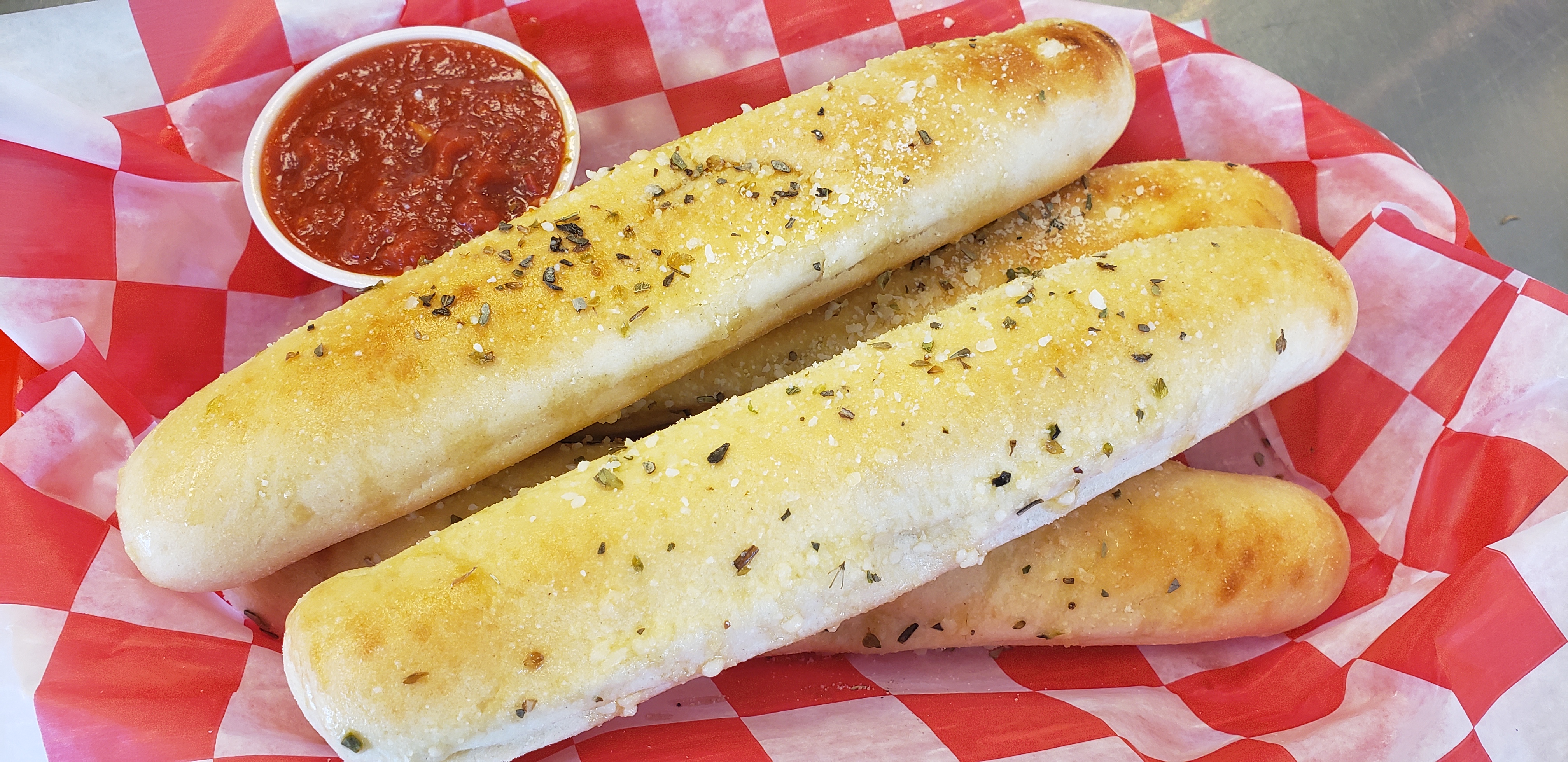 Order 4 Garlic & Herb Breadstix food online from The Ny Slice store, Greenwood on bringmethat.com