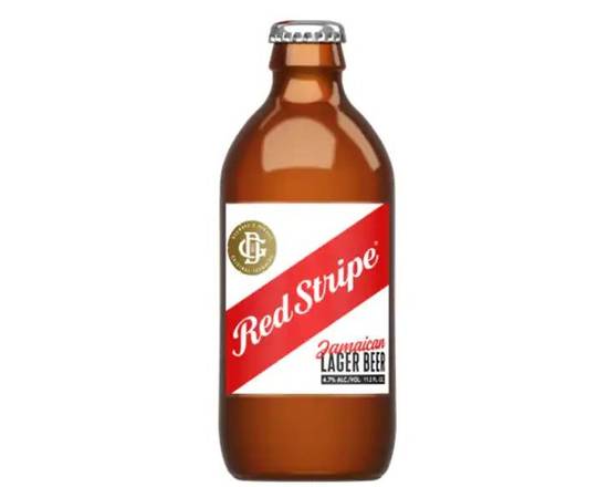 Order Red Stripe, 6pk-11.2oz bottle beer (4.7% ABV) food online from Tenderloin Liquor store, San Francisco on bringmethat.com