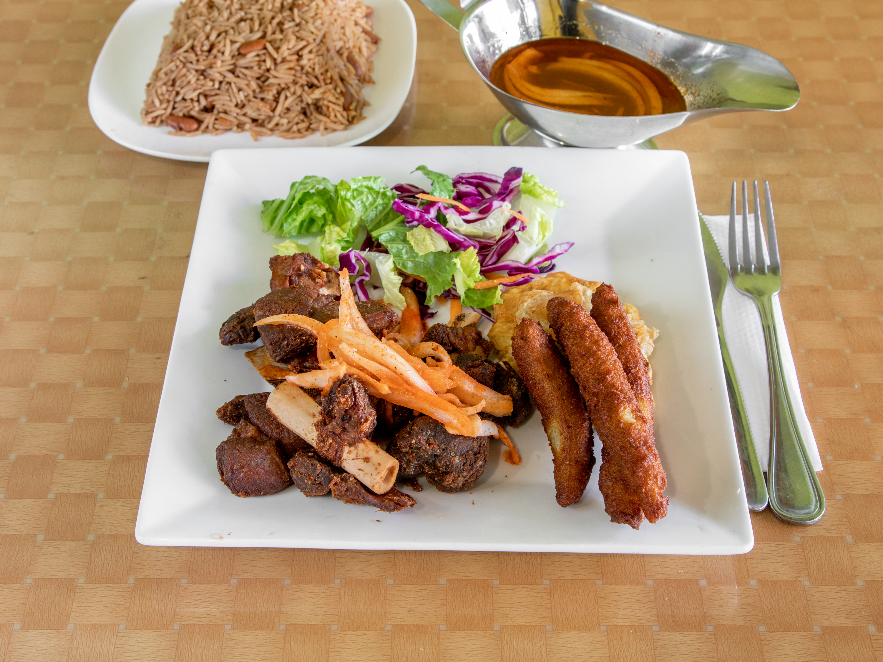Order Fried Goat food online from Le Soleil Restaurant store, New York on bringmethat.com