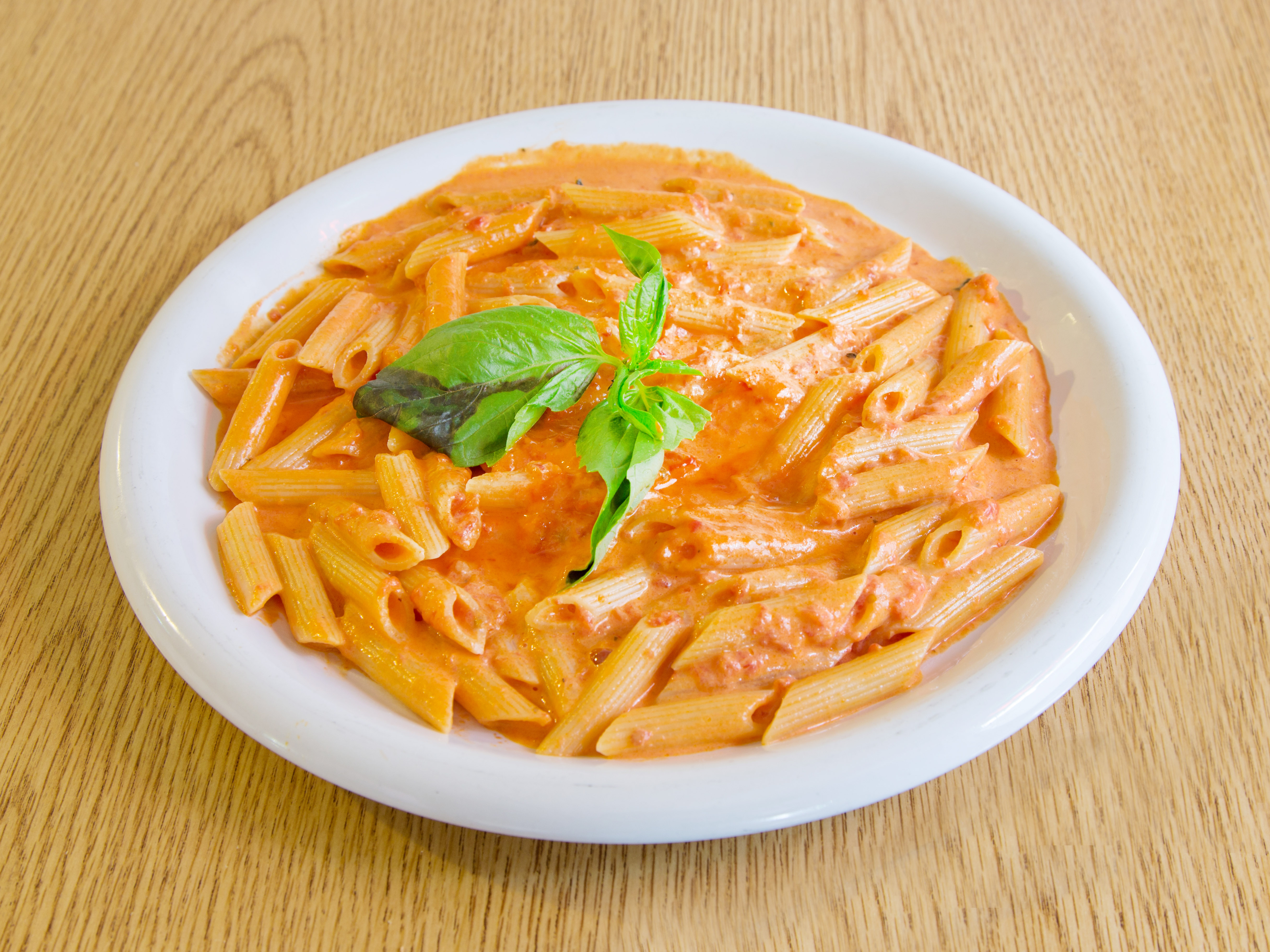 Order Penne Vodka food online from New Pizza On the Block store, West New York on bringmethat.com