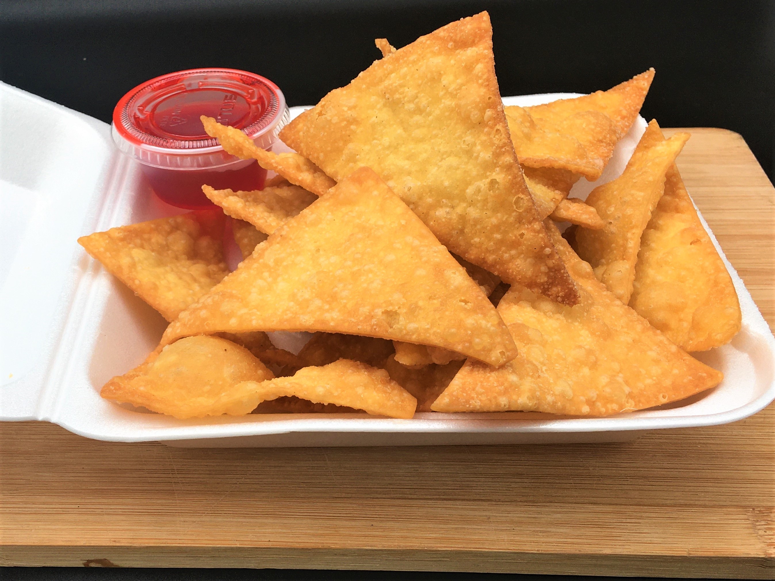 Order A11. Fried Wonton Chips (18pc) food online from Asian Kitchen store, Modesto on bringmethat.com