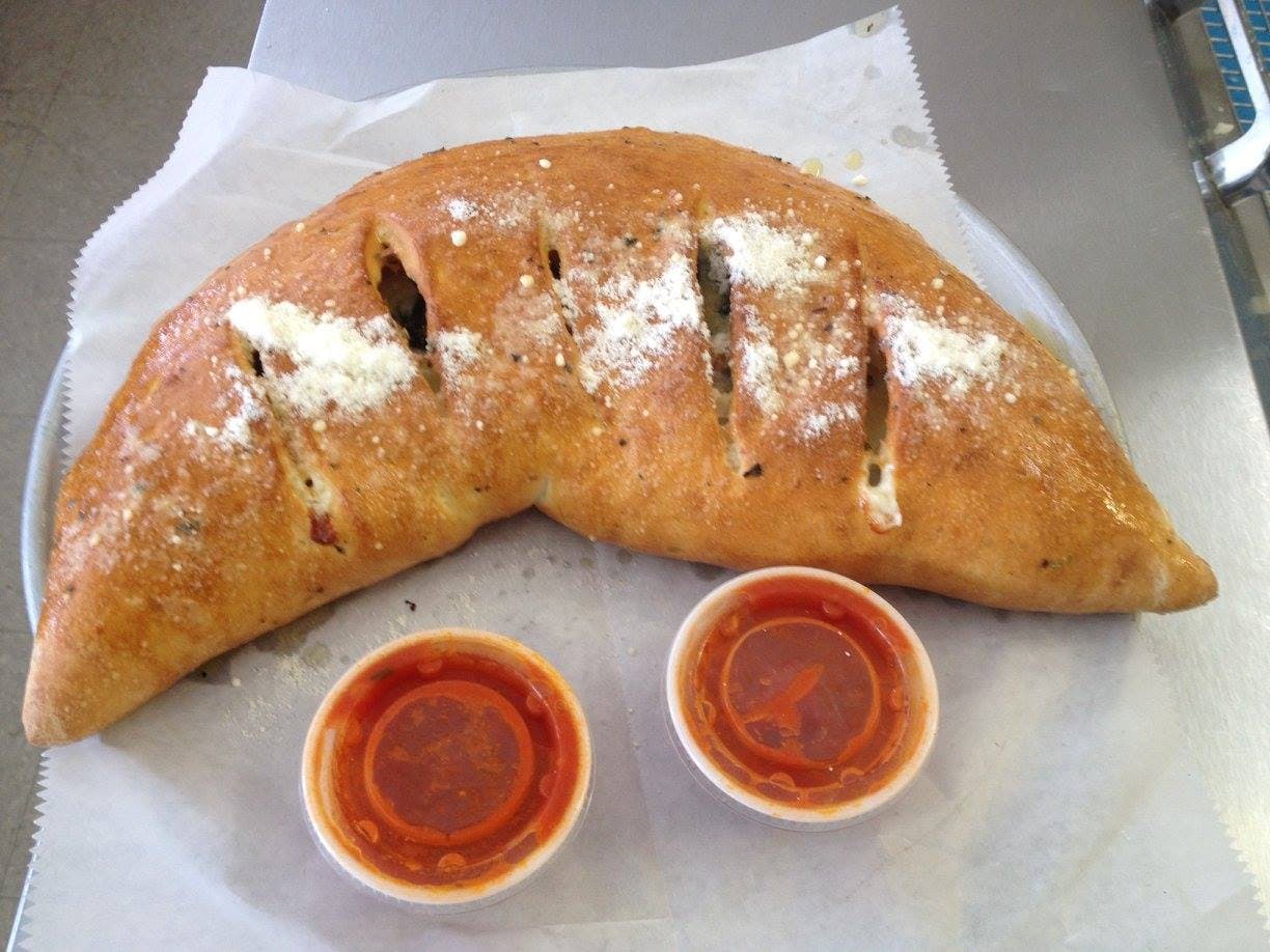 Order Chicken Broccoli Calzone - Small food online from Pizza Xpress store, Selma on bringmethat.com