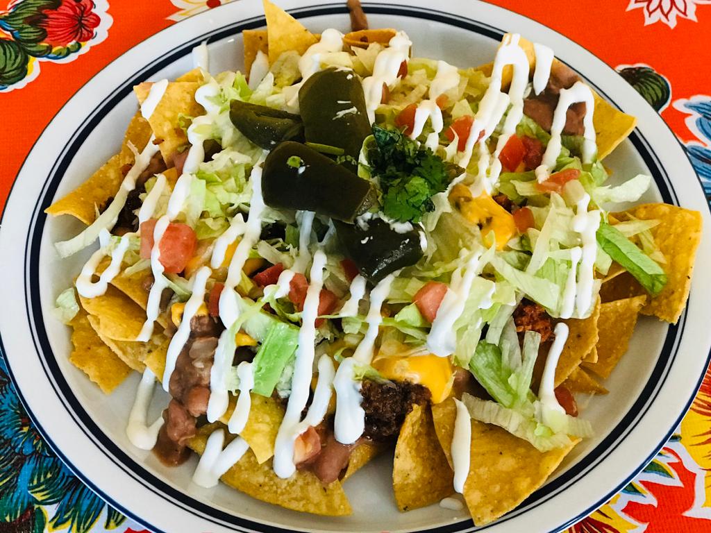 Order Nachos with meat food online from Jose Mexican Torta store, Arlington on bringmethat.com