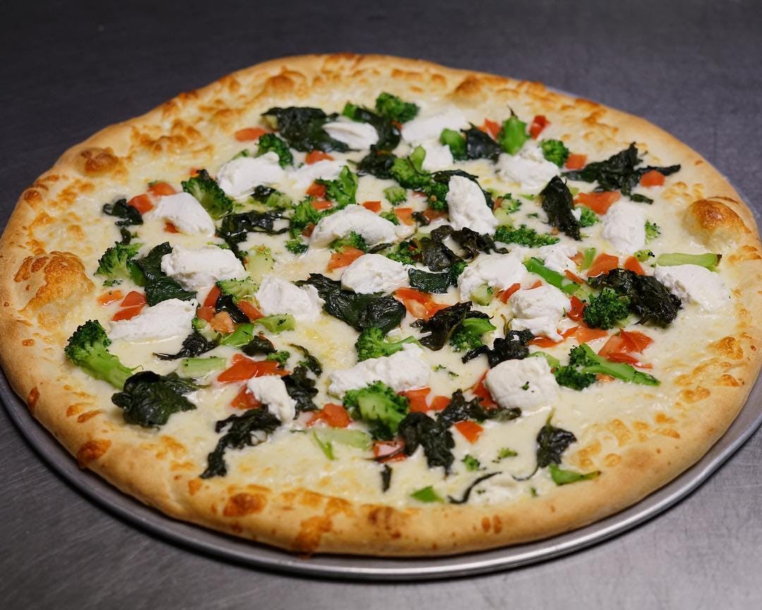 Order Veggie White Pizza - Personal 10'' food online from Arelis Italian Restaurant store, Bethlehem on bringmethat.com