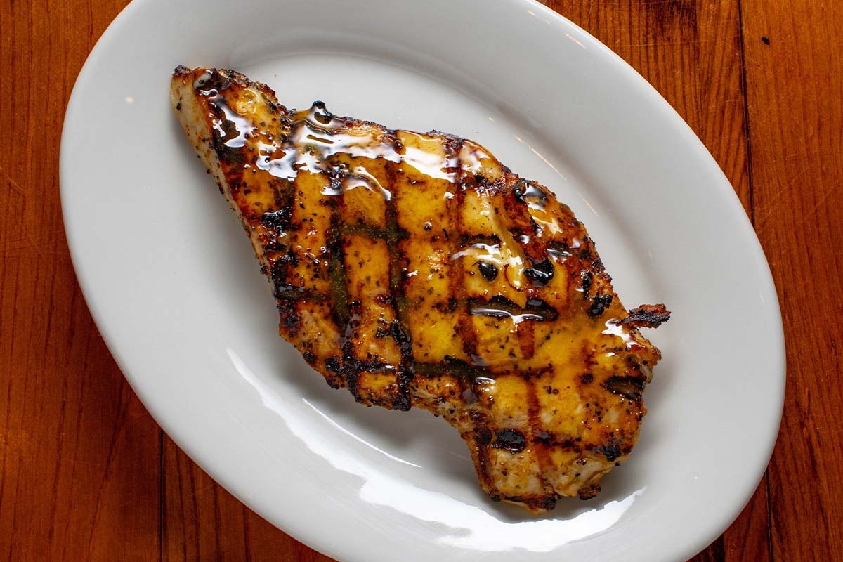 Order Chicken Breast -1 food online from Boudreaux's Cajun Kitchen store, Houston on bringmethat.com