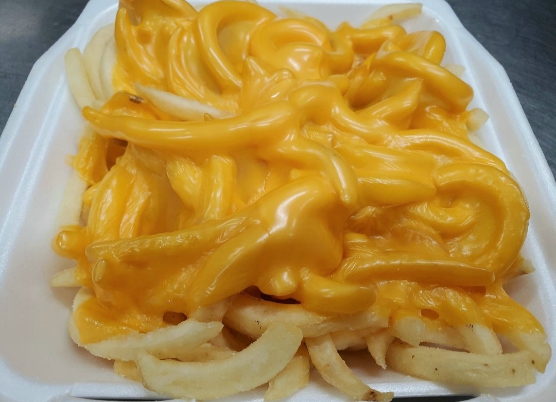 Order Cheese Fries food online from Hot Wings Cafe store, Pasadena on bringmethat.com