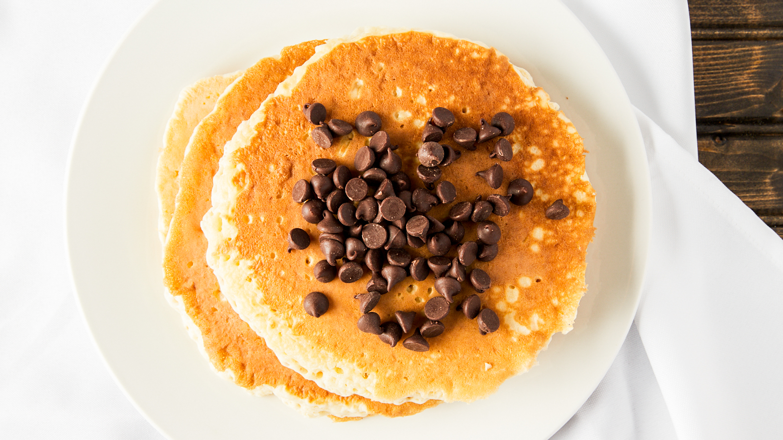 Order Chocolate Chip Pancakes (By Ghirardelli) food online from Hermosa store, Chicago on bringmethat.com