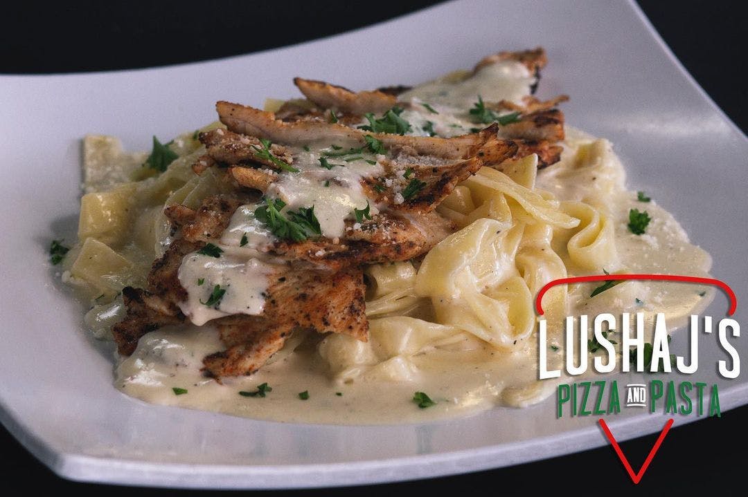 Order Chicken Fettuccine Alfredo - Entree food online from Lushaj Pizza & Pasta store, Euless on bringmethat.com