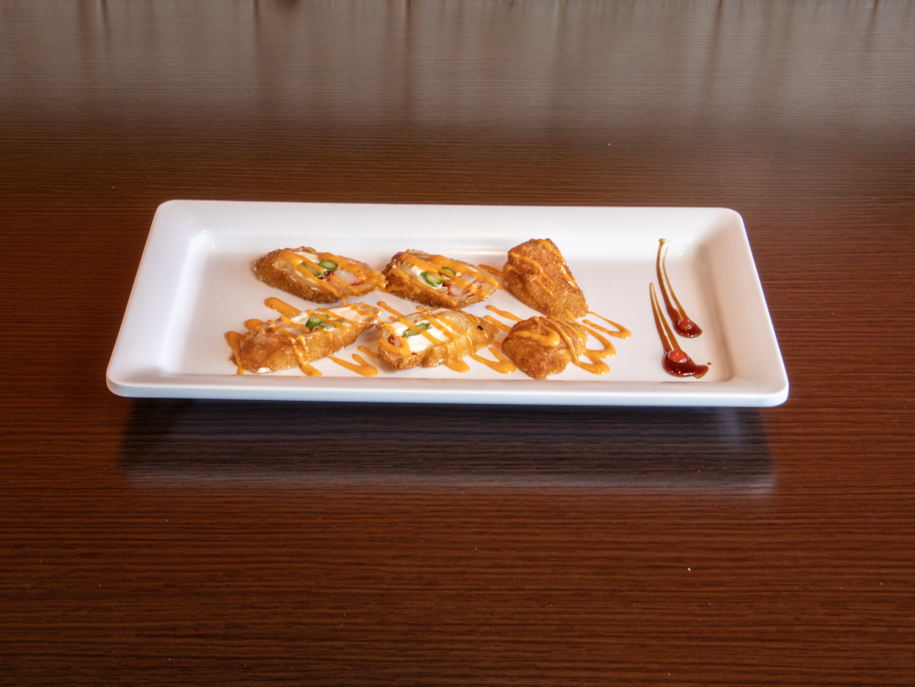 Order 9. Krab Egg Rolls food online from Hachi Sushi store, Loves Park on bringmethat.com