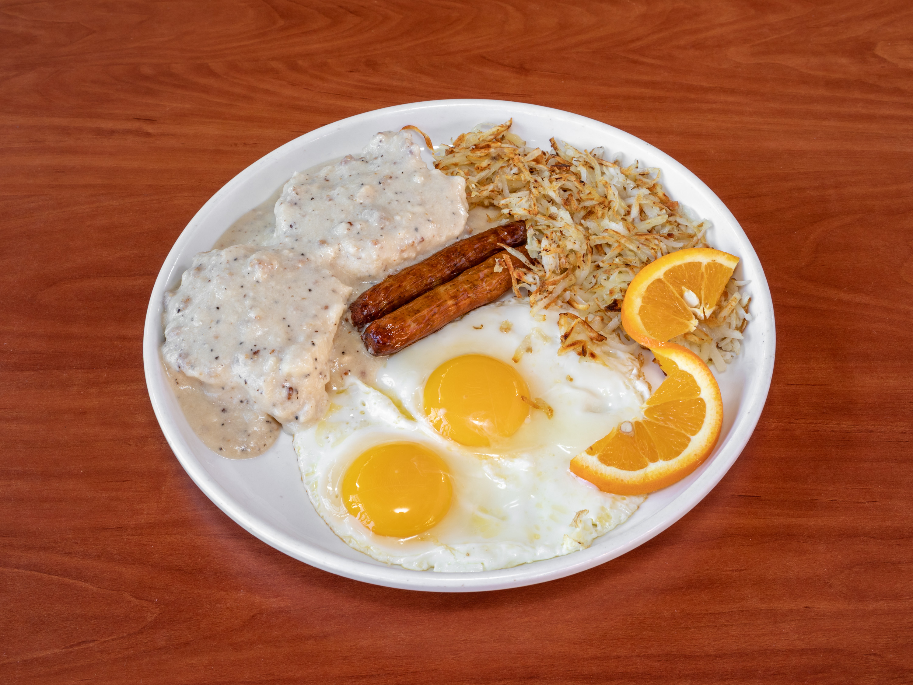Order Biscuit and Gravy Sausage and Eggs  food online from Melrose Kitchen store, Phoenix on bringmethat.com
