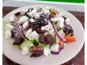 Order Greek Salad food online from Frankie's Pizza store, Las Vegas on bringmethat.com