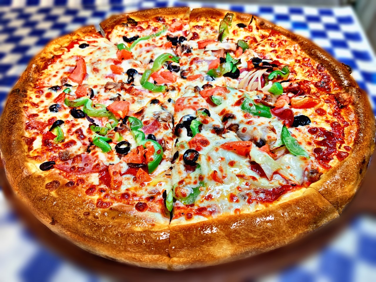Order Large Village Ten Topping Special Pizza 15'' food online from Village Pizza & Seafood store, Santa Fe on bringmethat.com