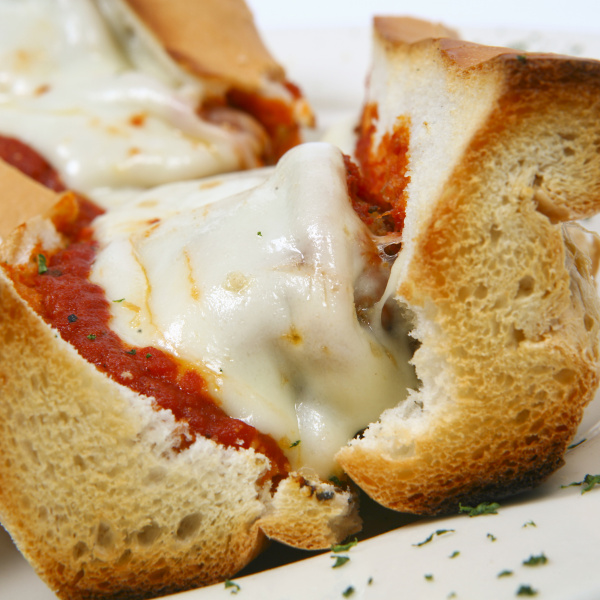 Order Veal Parmigiana Sub food online from Napoli Pizza & Pasta - Beechnut St. store, Houston on bringmethat.com