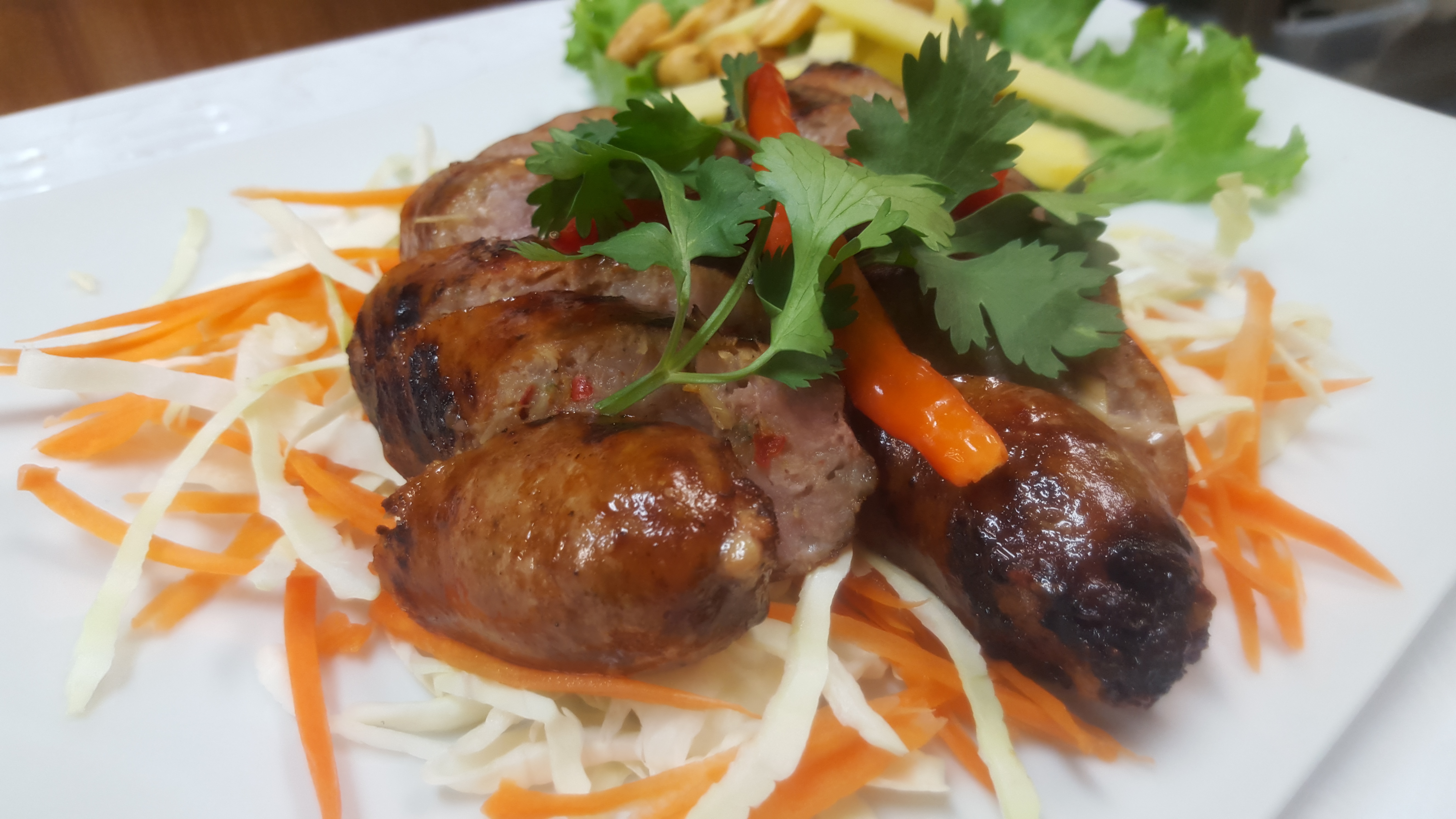 Order Thai Spicy Sausage food online from Thai House store, Kansas City on bringmethat.com