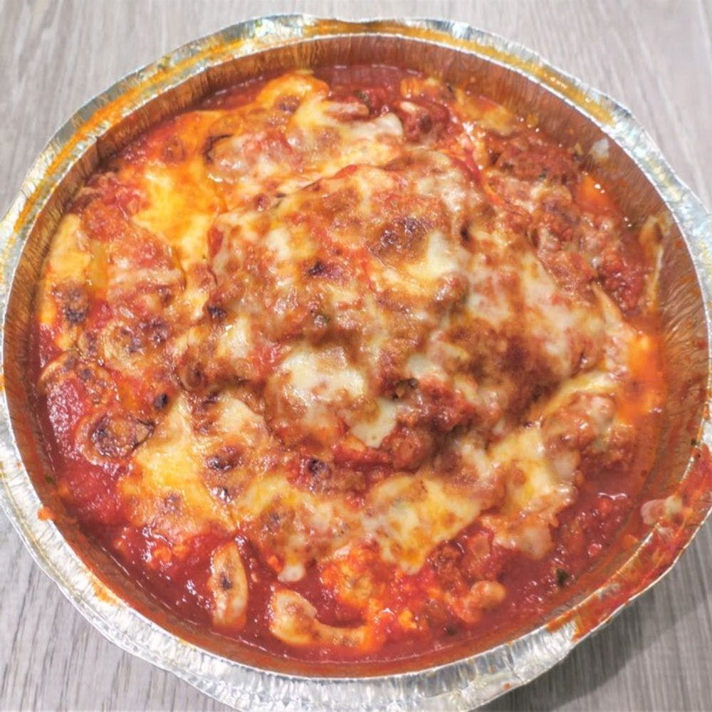 Order Homemade Lasagna with Meat Sauce - Pasta food online from Cousins Pizza store, Norwood on bringmethat.com