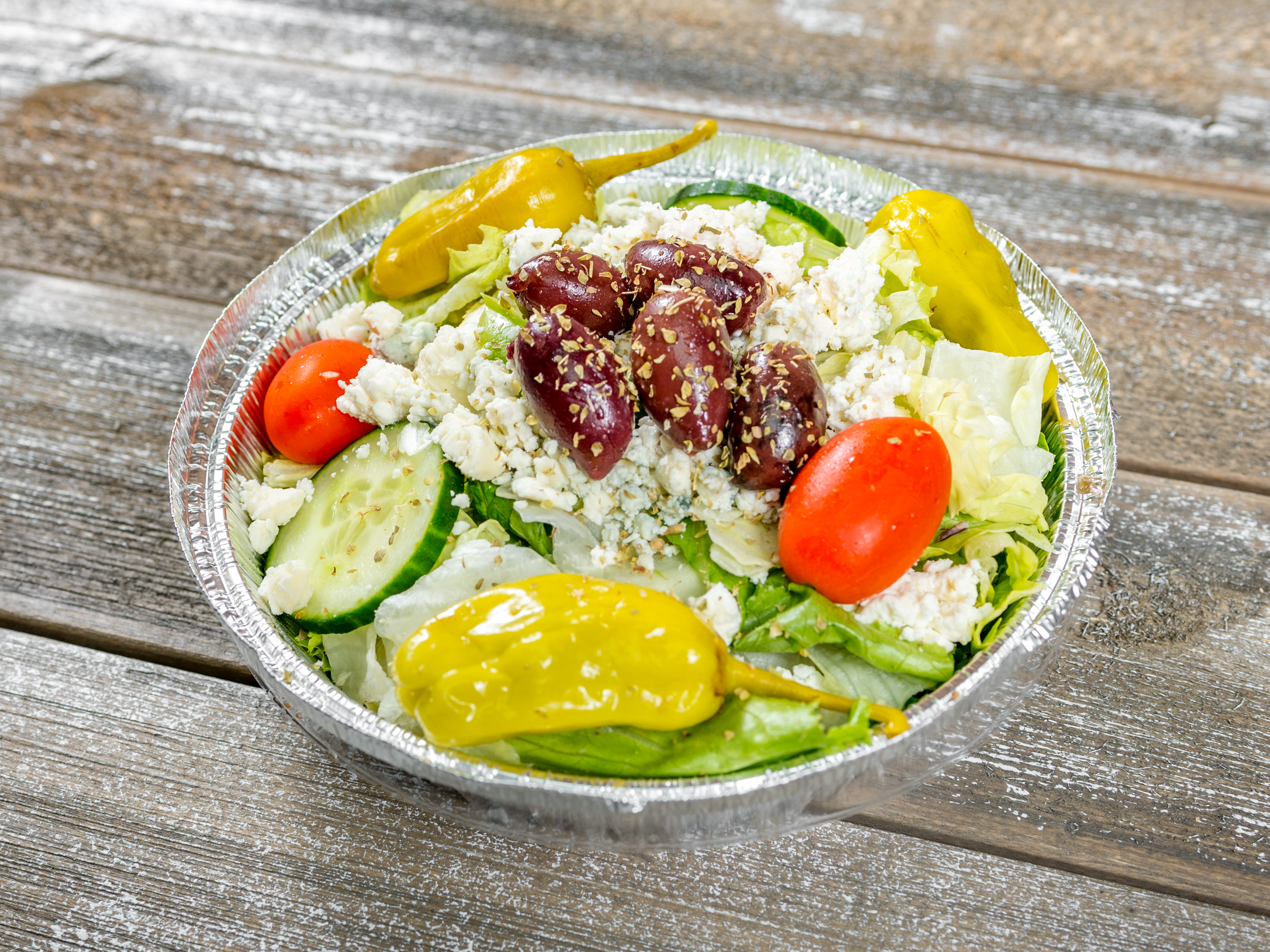 Order Greek Salad food online from Cravings Gourmet Deli store, Lancaster on bringmethat.com