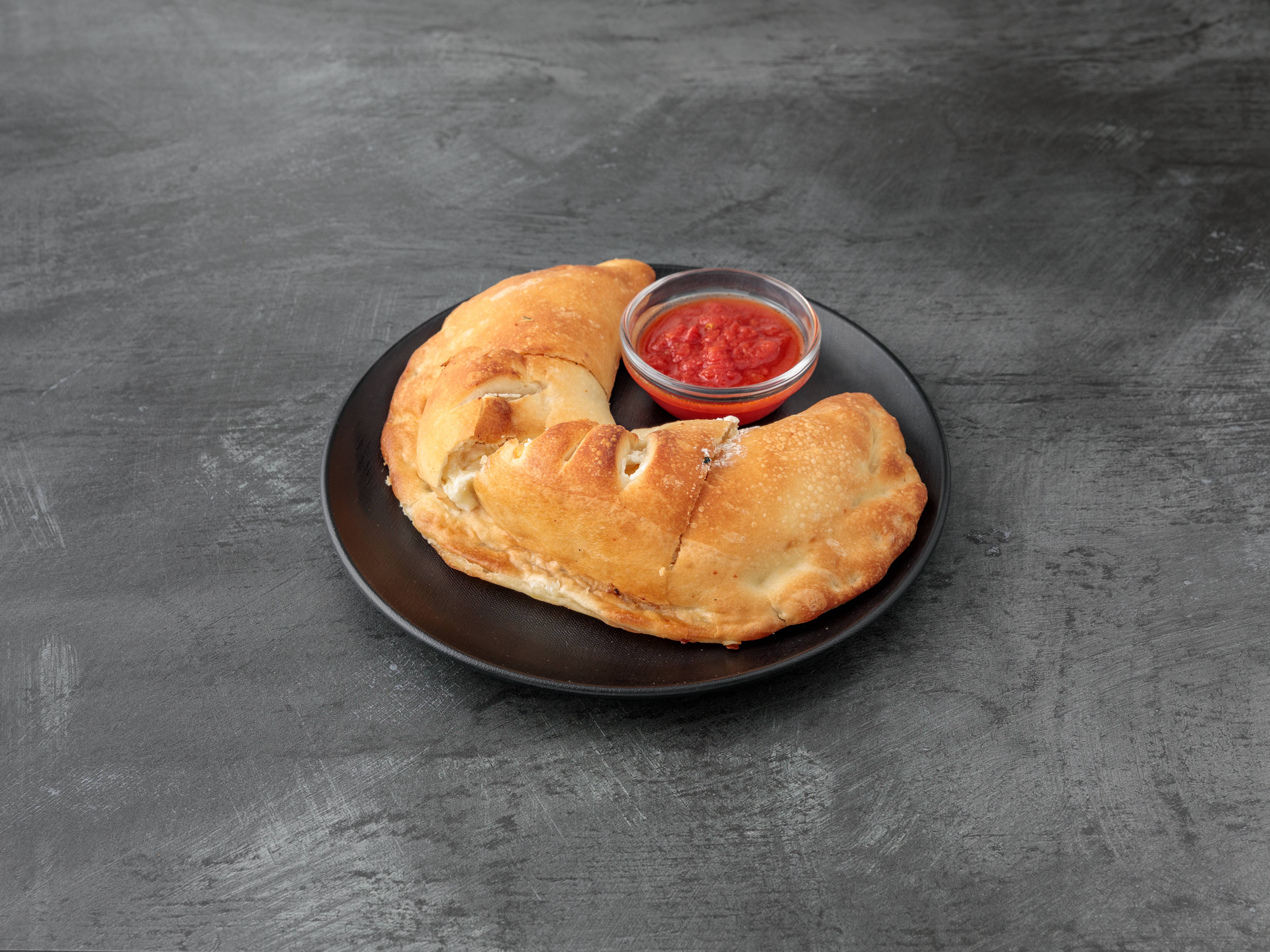 Order Cheese Calzone food online from Famous Famiglia Pizza store, New York on bringmethat.com
