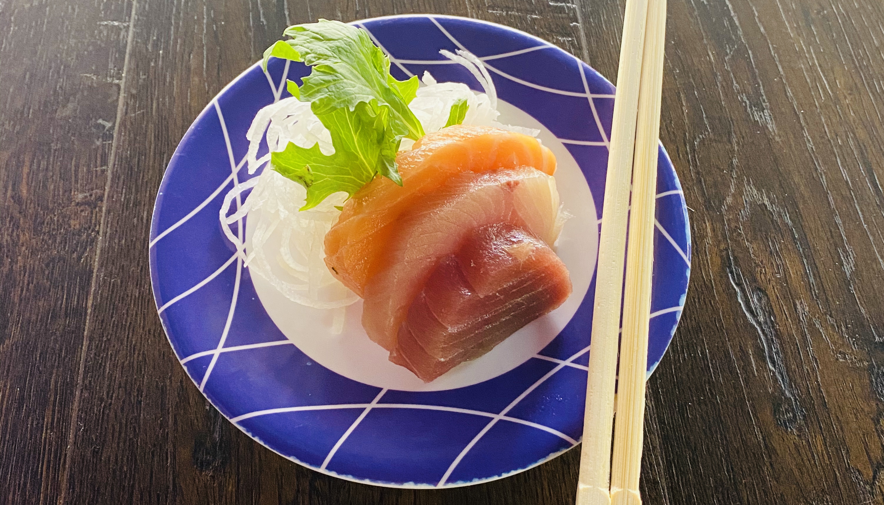 Order Salmon, Tuna and Yellow Tail Sashimi - 3 Pieces food online from Sushi Train store, Minneapolis on bringmethat.com