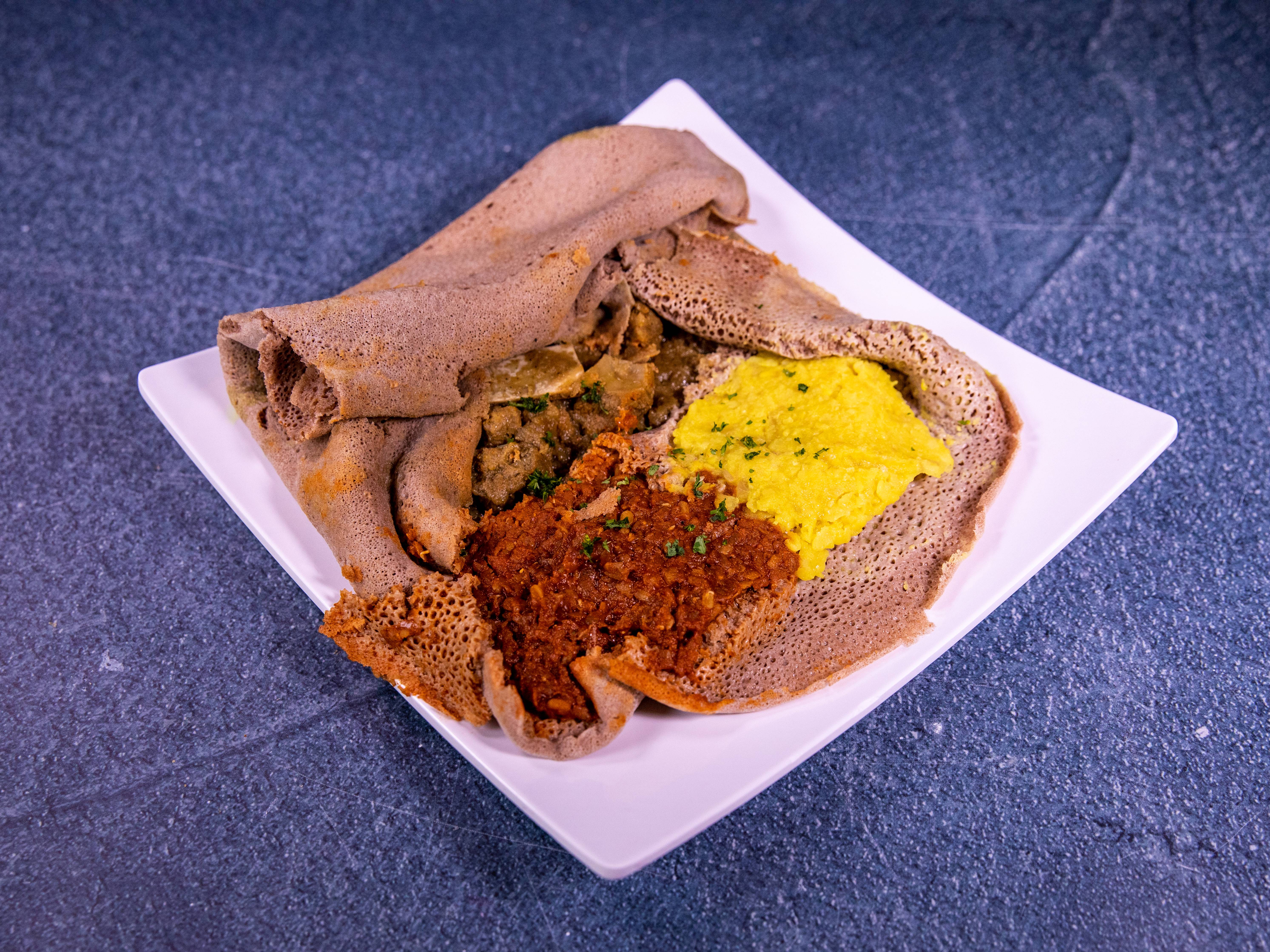 Order Yebeg Alicha Wot food online from Blue Nile Ethiopian Restaurant store, Houston on bringmethat.com