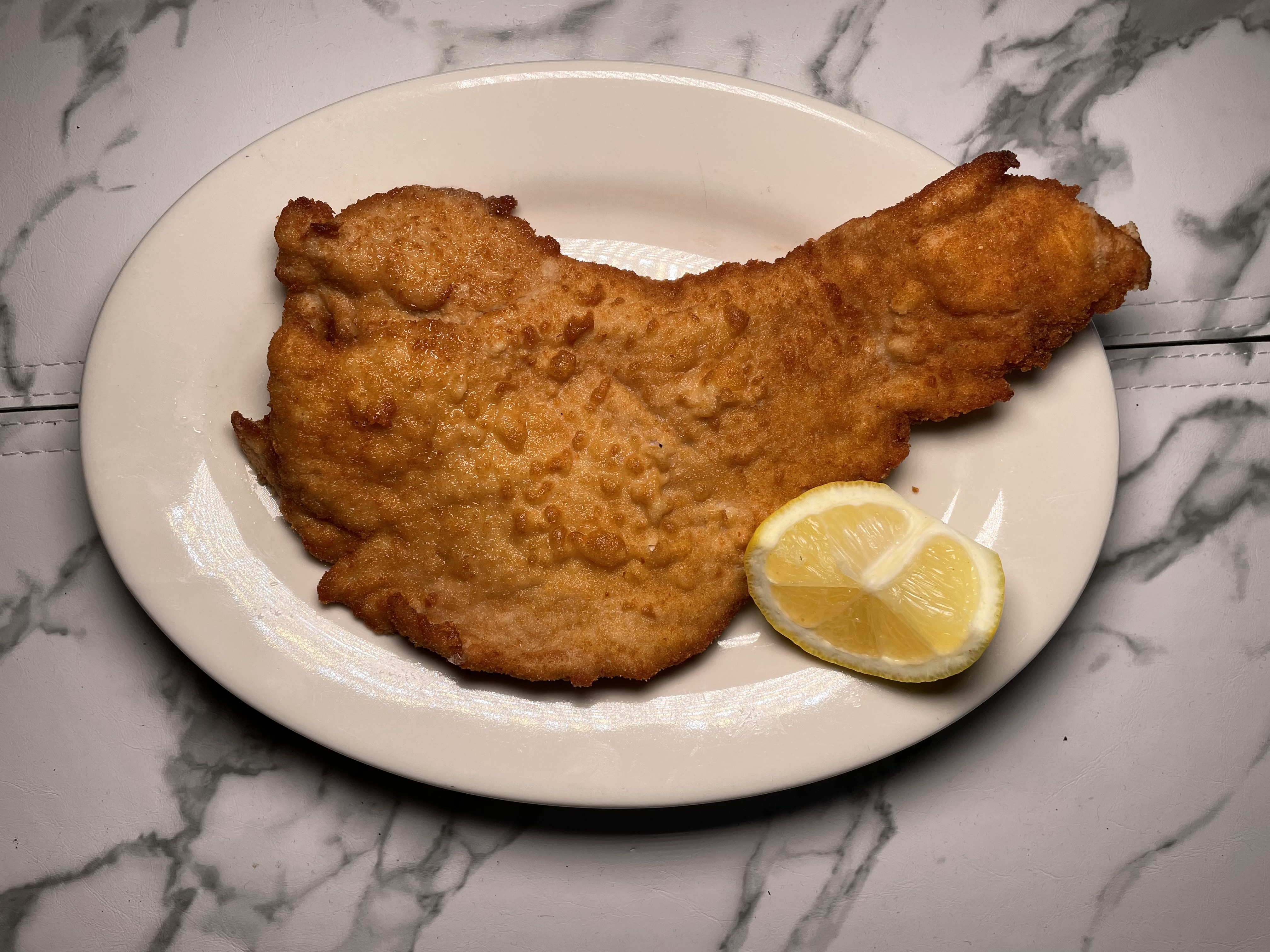 Order Veal Cutlet Milanese with Spaghetti food online from Pines of Rome store, Bethesda on bringmethat.com