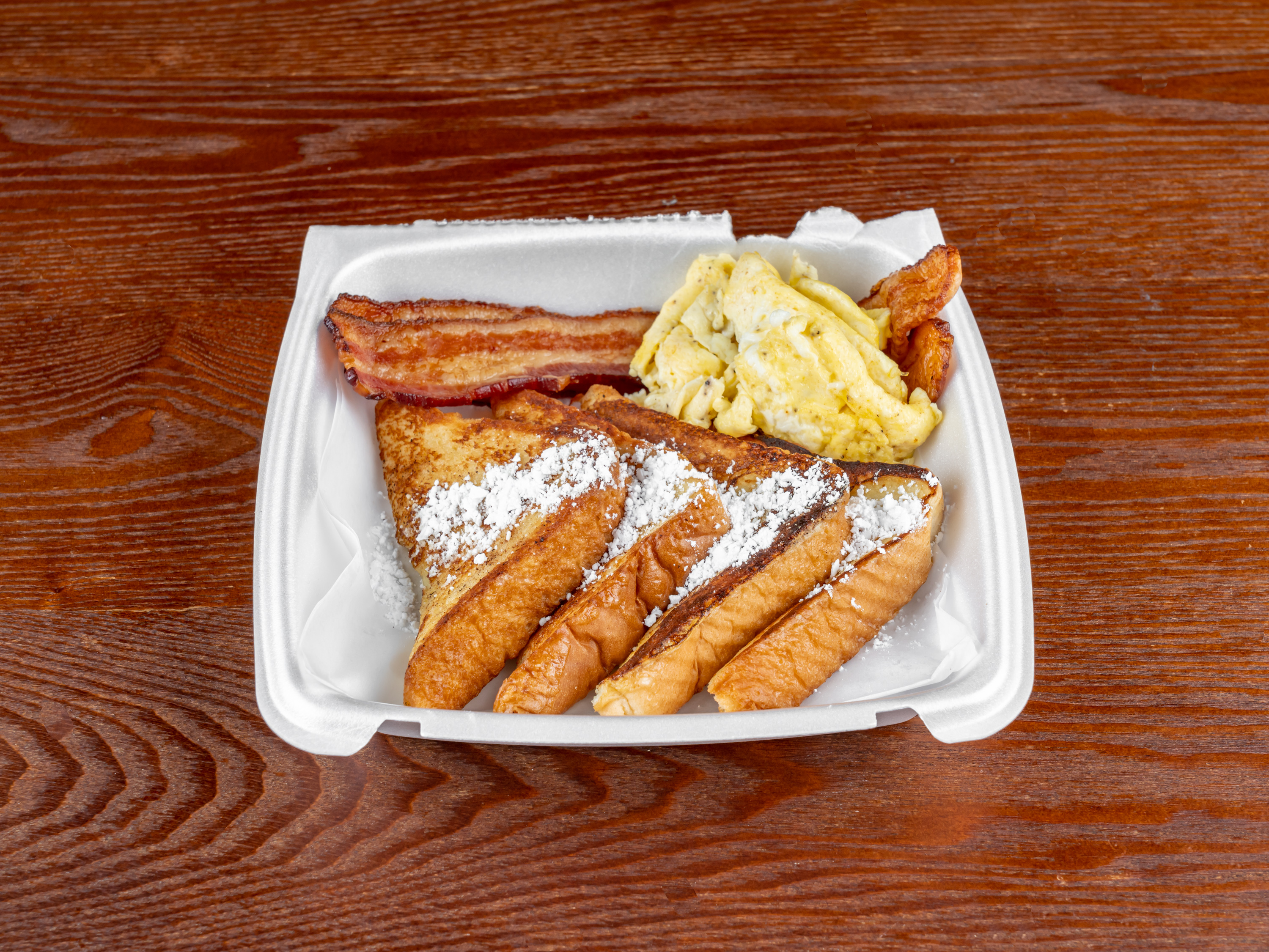 Order 2 French Toast, 2 Eggs and 2 Bacon food online from Meraki Kitchen store, Houston on bringmethat.com