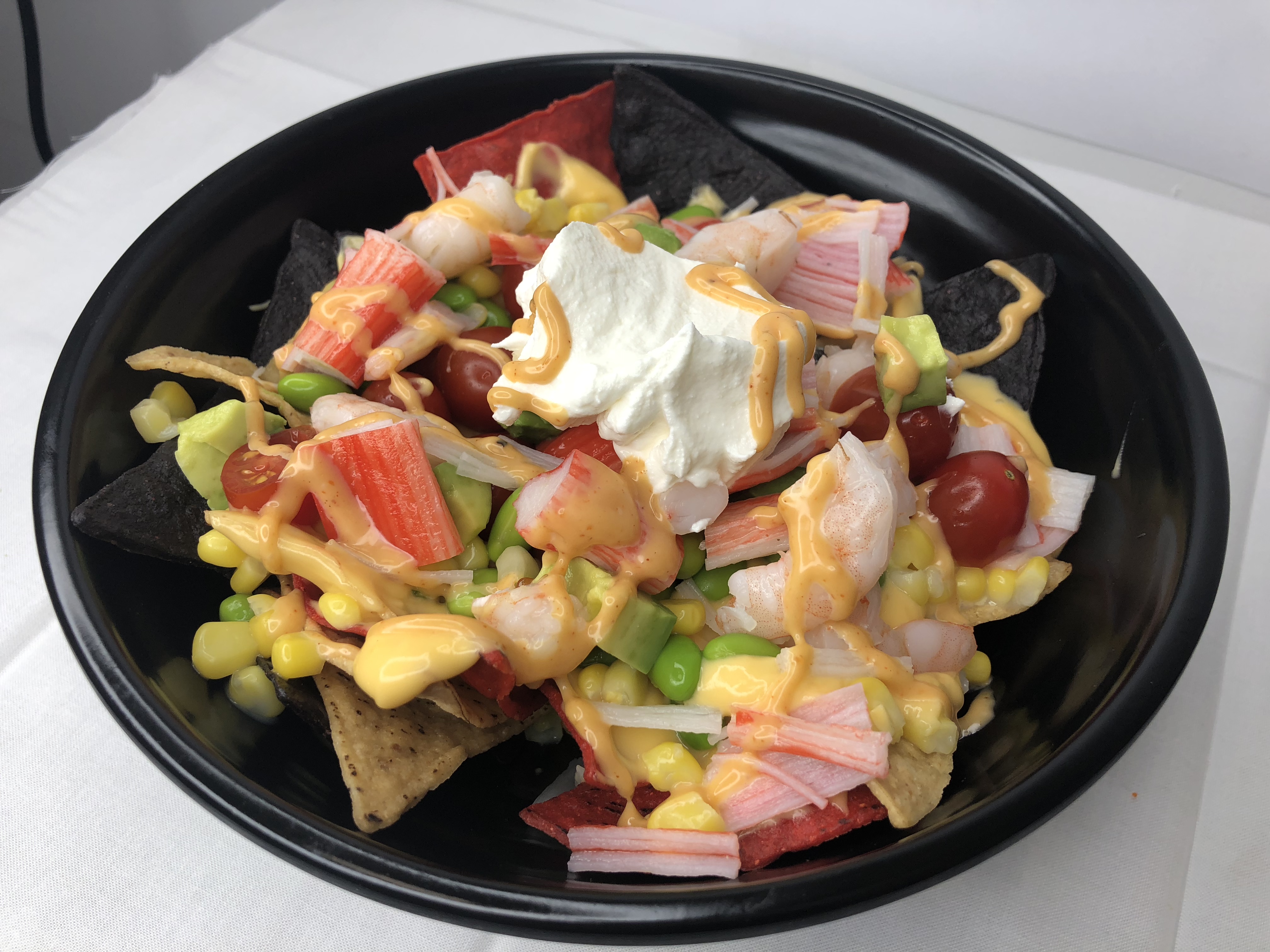 Order 19. Seafood Nacho Bowl food online from A Little More store, Columbia on bringmethat.com