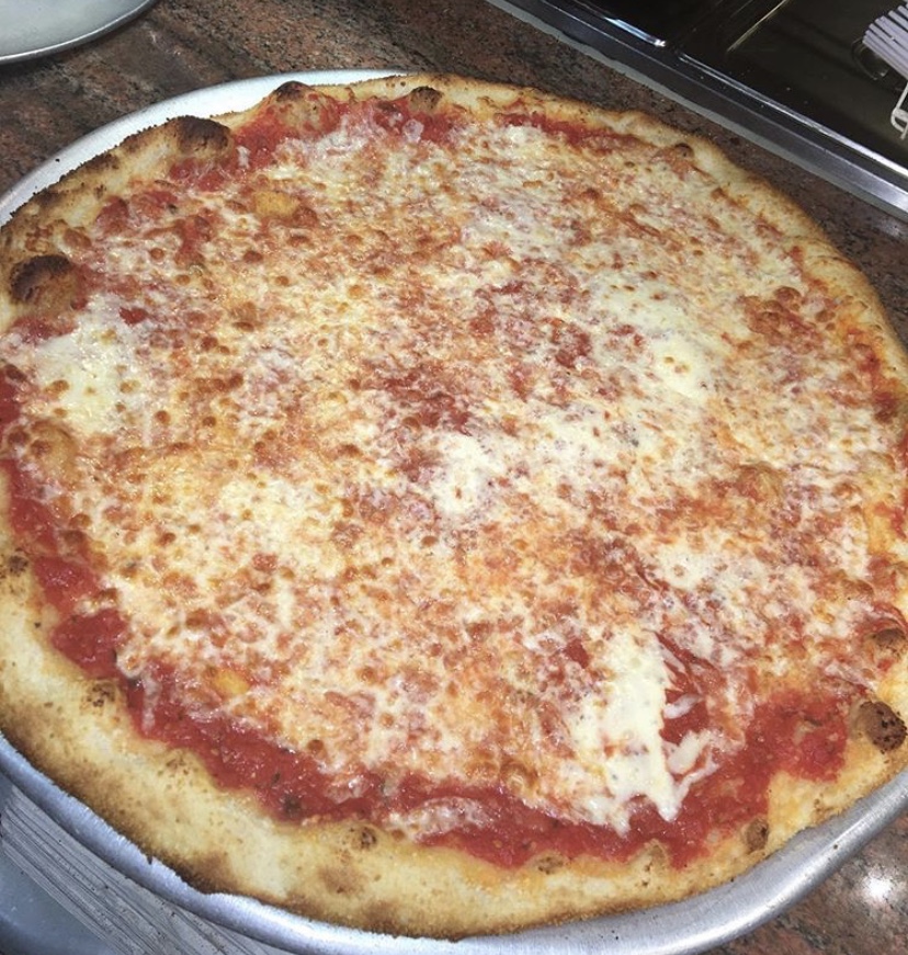 Order Round Pie food online from Italia pizza store, Brooklyn on bringmethat.com