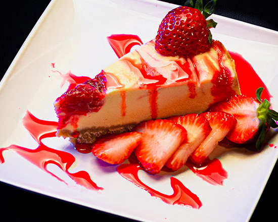 Order Cheese Cake de strawberry food online from Versace Dominican Restaurant store, Lilburn on bringmethat.com