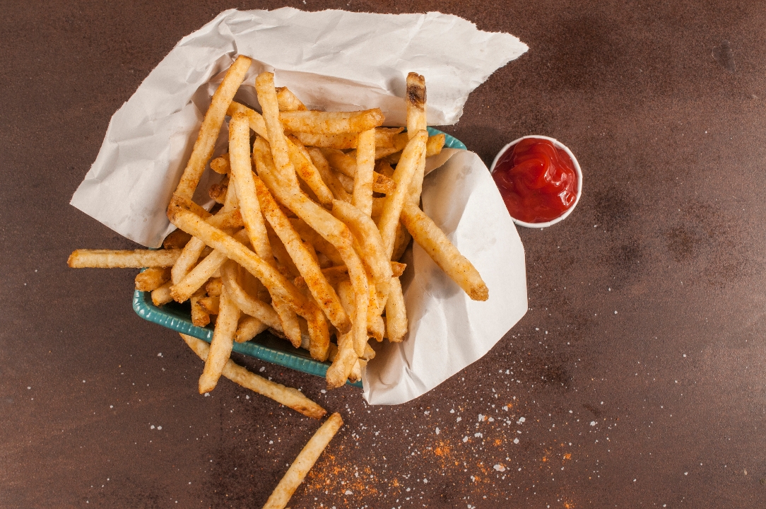 Order Space Fries food online from Comet Chicken store, Fort Collins on bringmethat.com