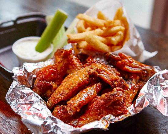 Order 12 Wings Meal Combo Includes 2 Drinks food online from Buffalo boss store, Brooklyn on bringmethat.com