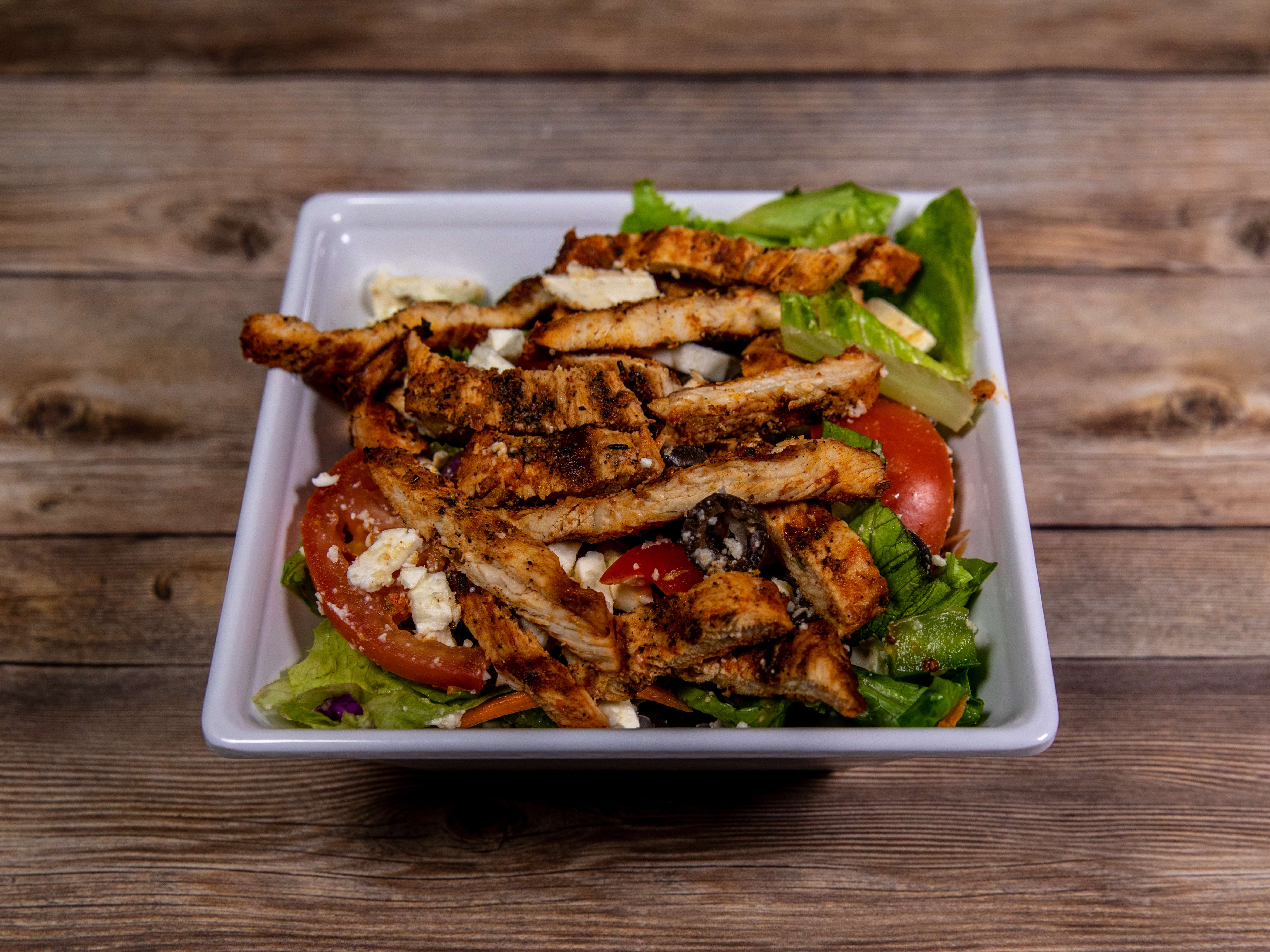 Order Greek Salad with Chicken food online from Romas Italian Bistro store, Grand Prairie on bringmethat.com