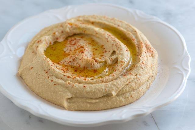 Order Hummus food online from Sahara Cafe store, Raleigh on bringmethat.com