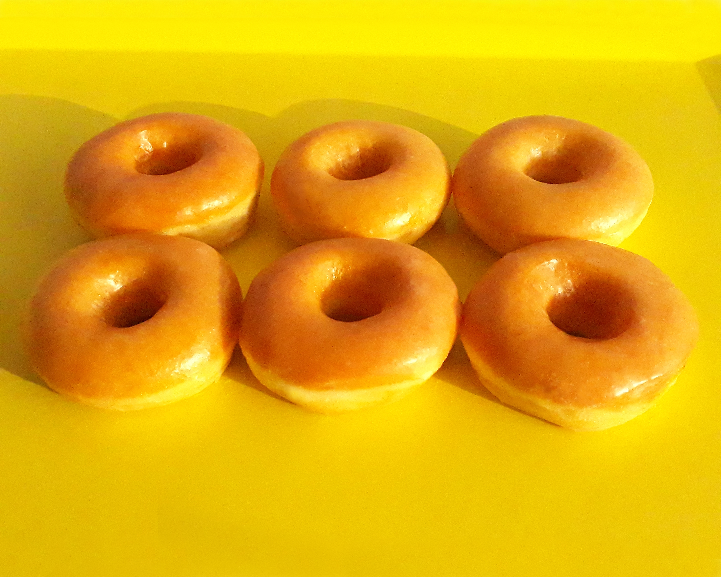 Order 6 Glazed Donut food online from Jaram's Donuts store, Dallas on bringmethat.com