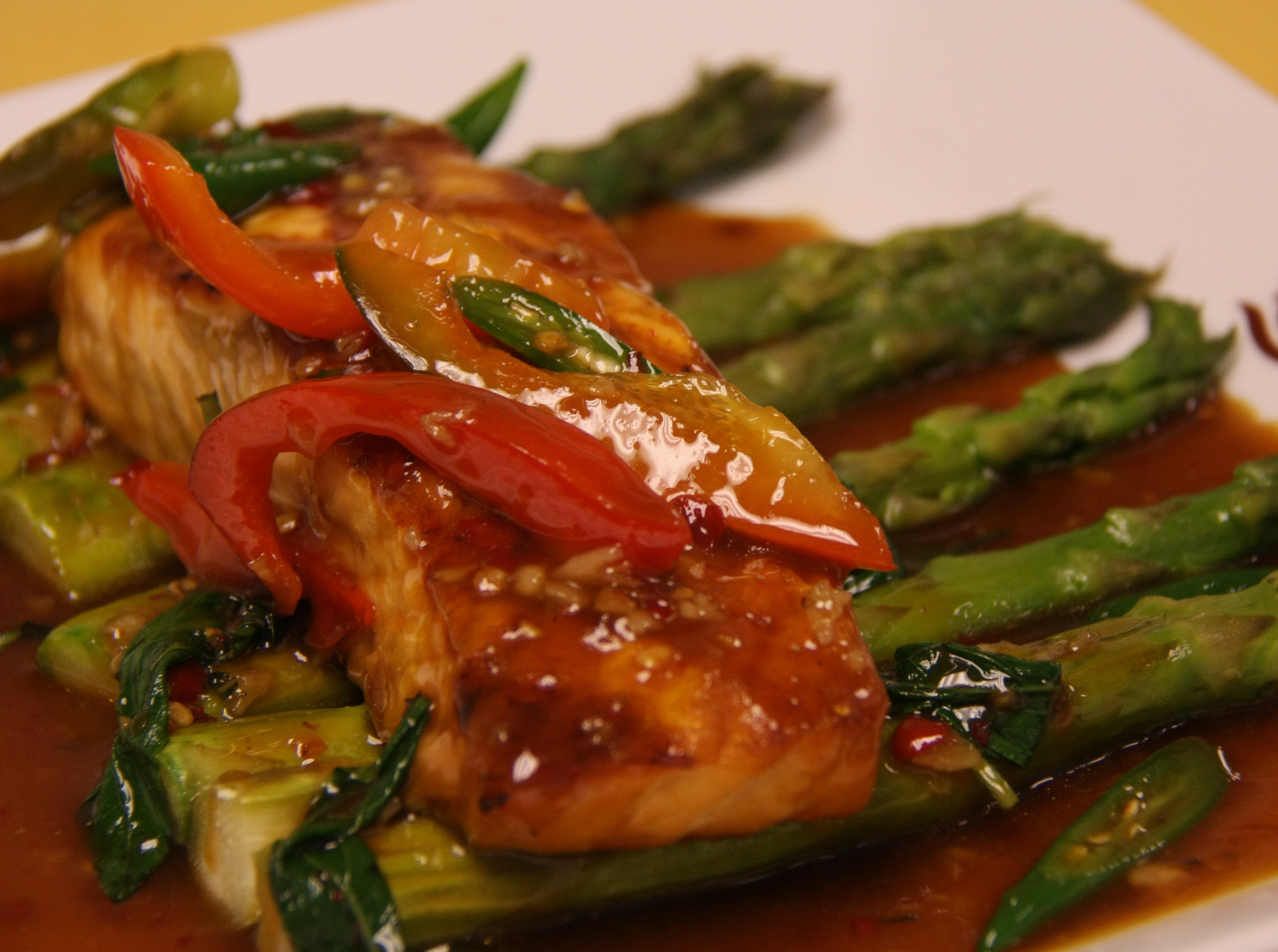Order 30. Kapow Grilled King Salmon food online from Thai Pavilion National store, Oxon Hill on bringmethat.com