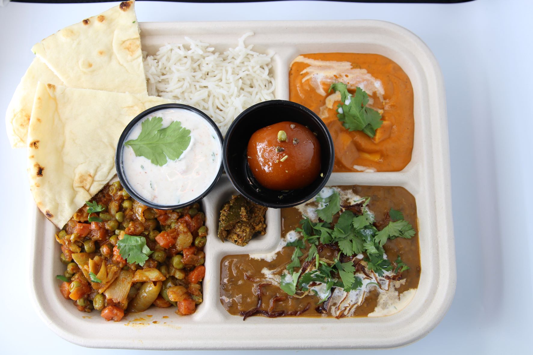 Order Veg Thali  food online from Nidhi Caterers store, Richardson on bringmethat.com
