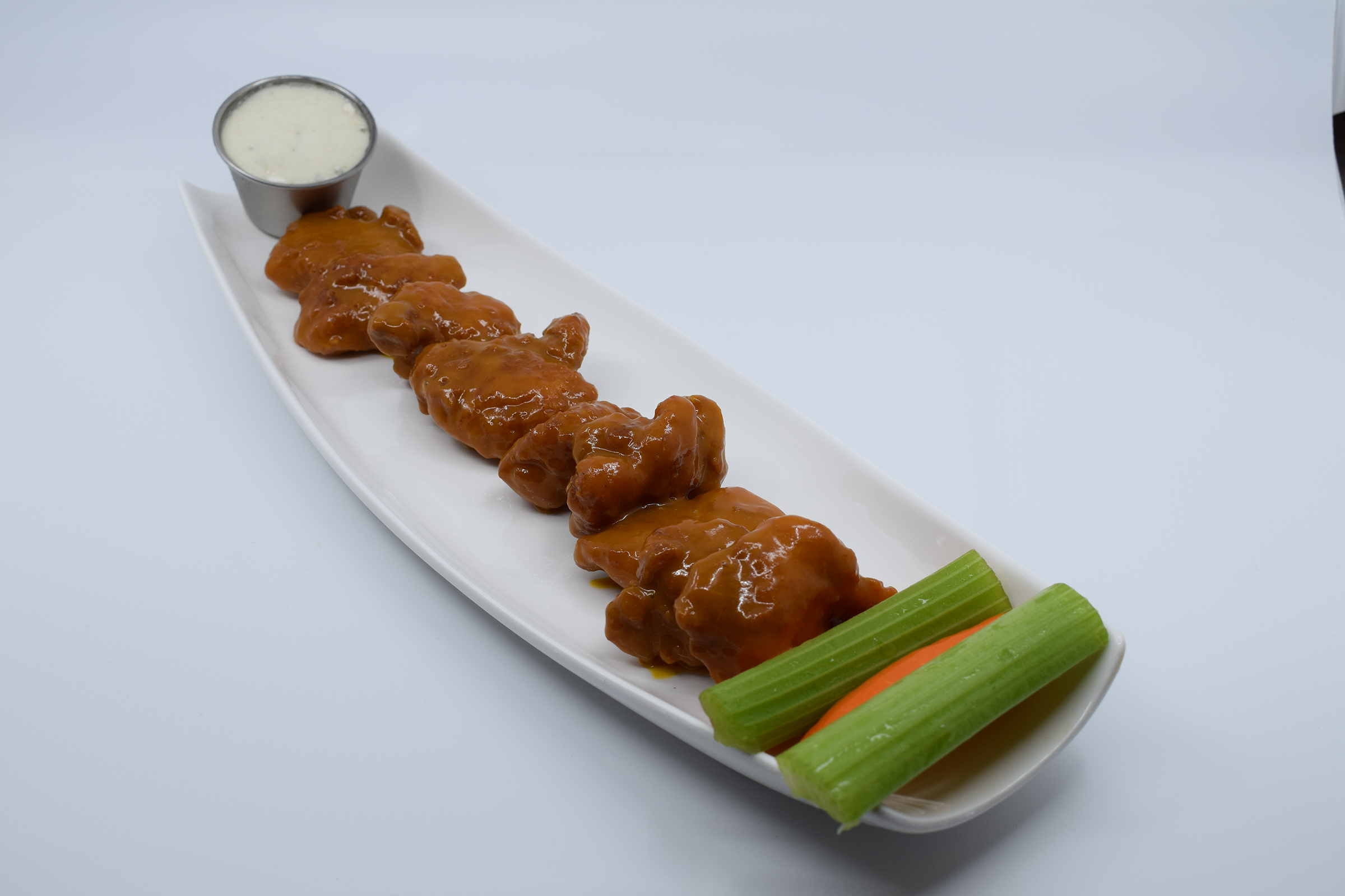 Order Boneless Carolina Tangy Gold BBQ Wings food online from Mad House Comedy Club store, San Diego on bringmethat.com
