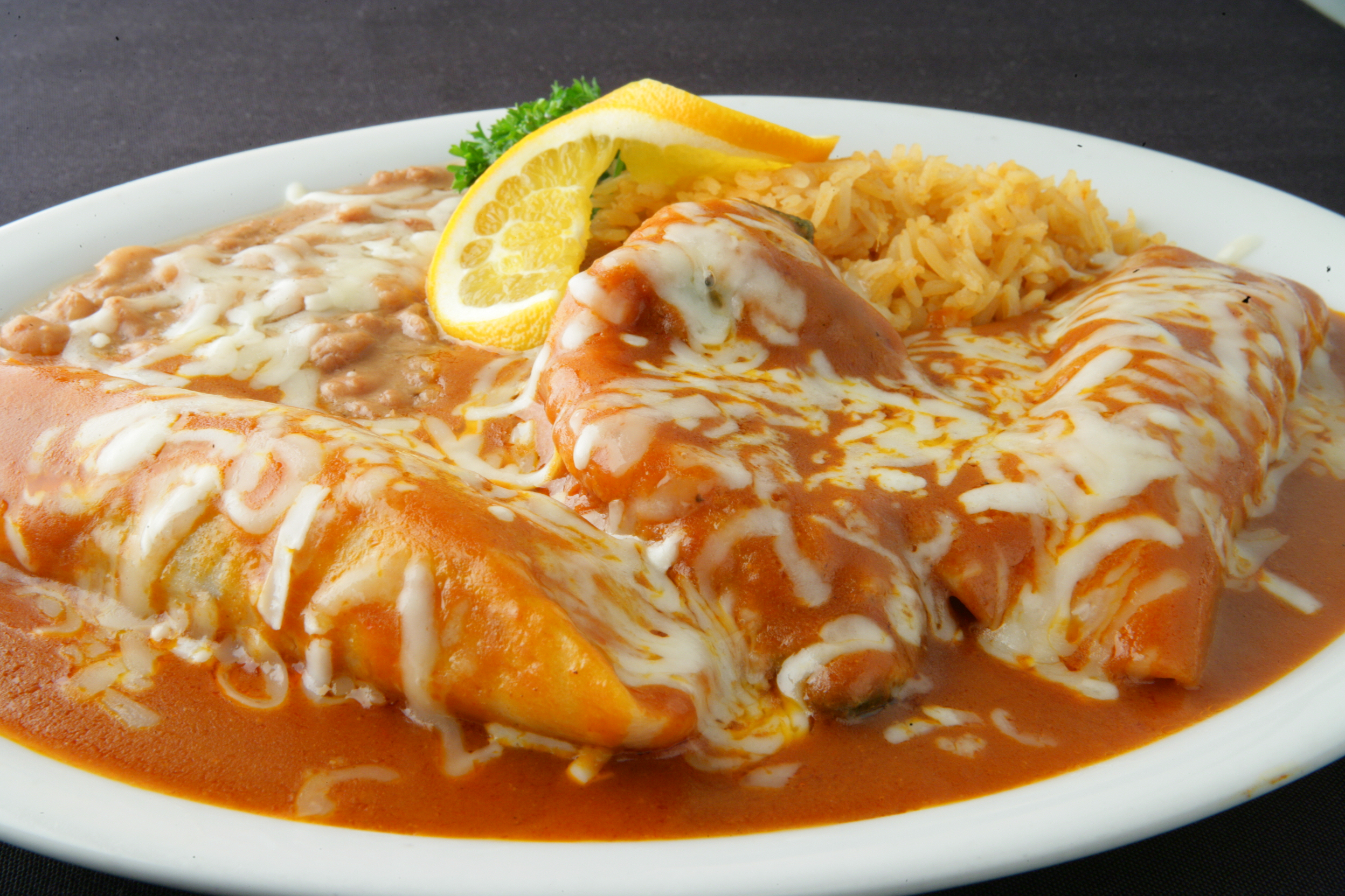 Order Enchilada Tamale Chile Relleno Rice and Bean Combo food online from Chapala Mexican Restaurant store, Brentwood on bringmethat.com